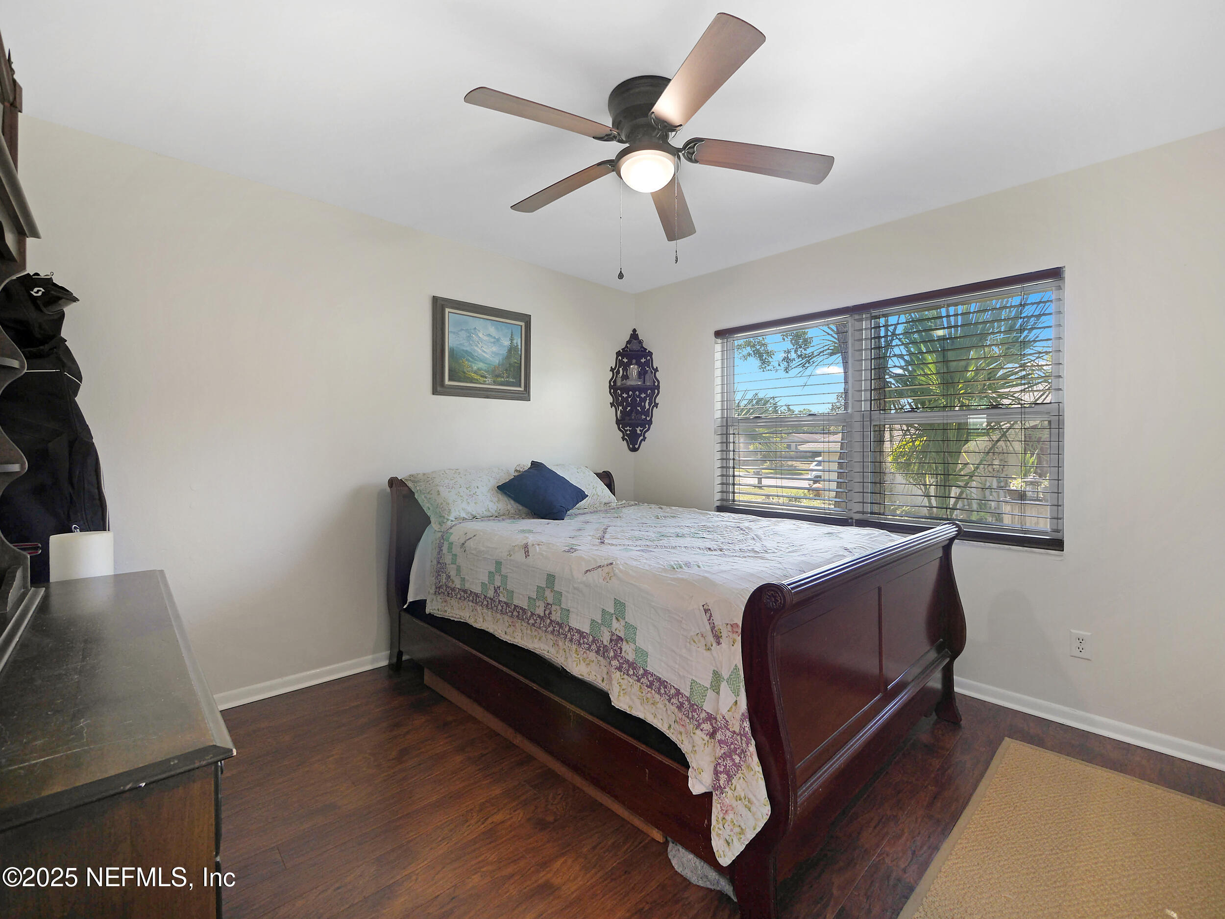 971 Viscaya Boulevard St. Augustine, FL 32086 - Photo 16 of 47 a bedroom with a bed and window