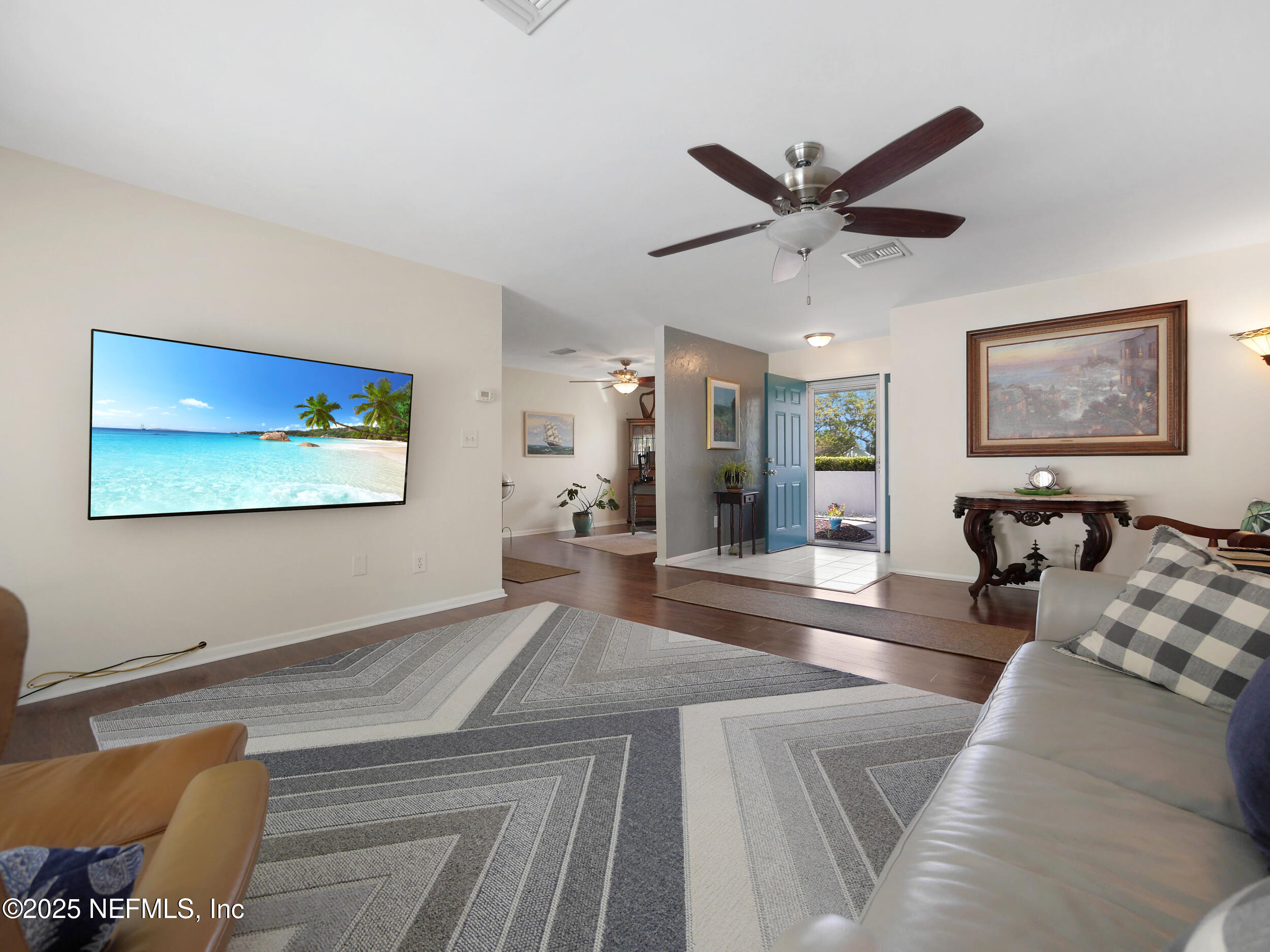 971 Viscaya Boulevard St. Augustine, FL 32086 - Photo 25 of 47 a living room with furniture and a ceiling fan