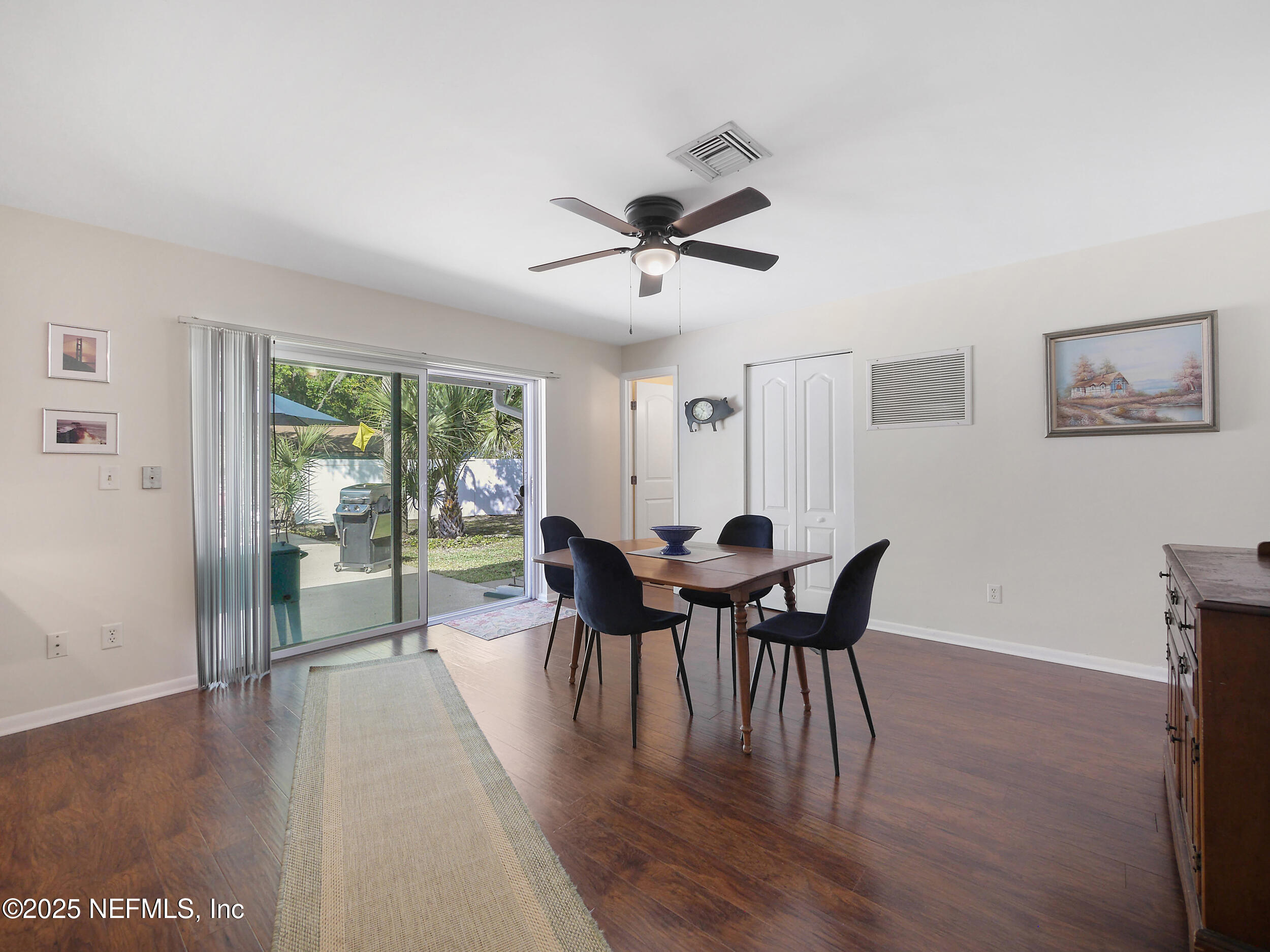971 Viscaya Boulevard St. Augustine, FL 32086 - Photo 28 of 47 a view of a dining room with furniture window and wooden floor