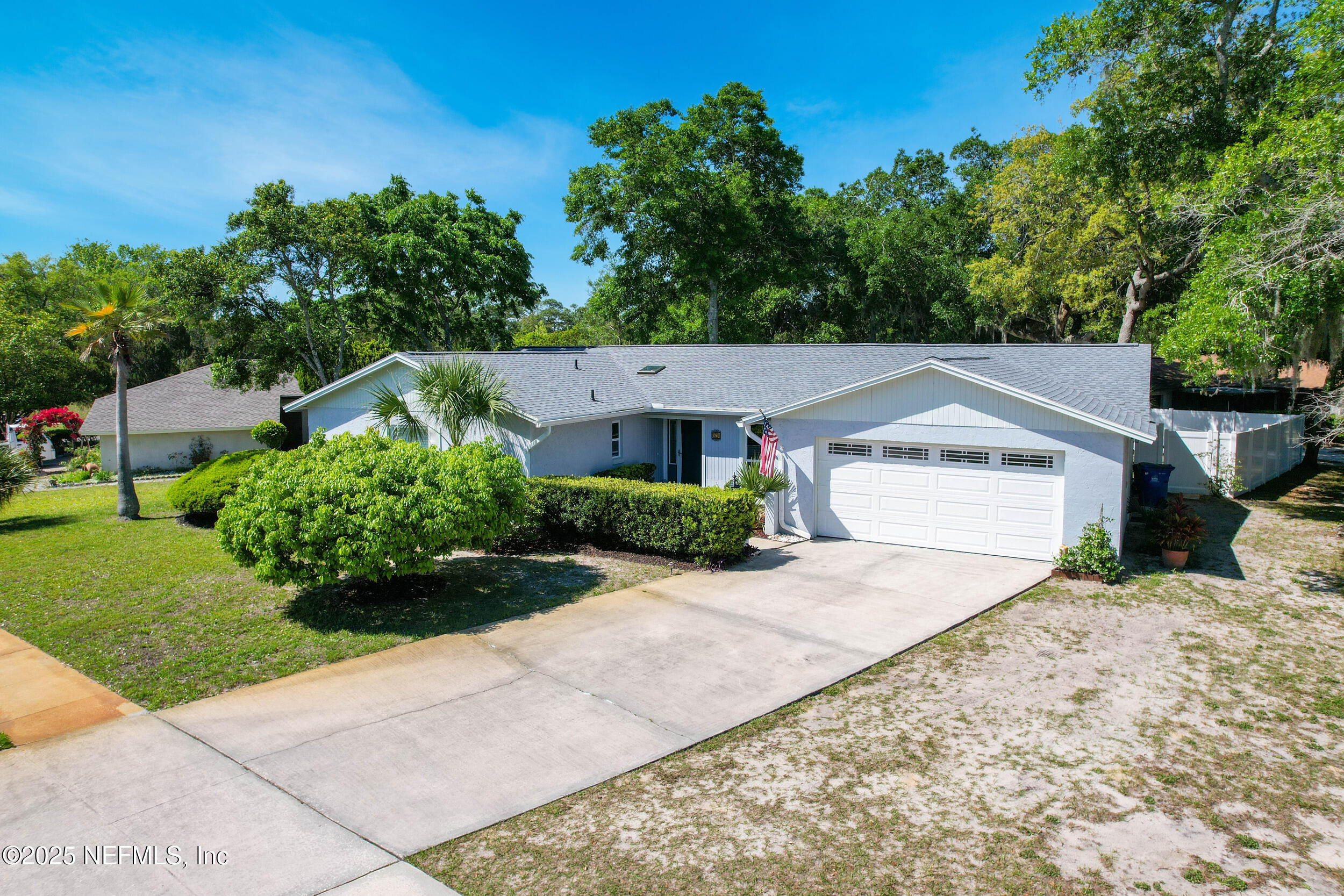 971 Viscaya Boulevard St. Augustine, FL 32086 - Photo 3 of 47 a front view of a house with a yard