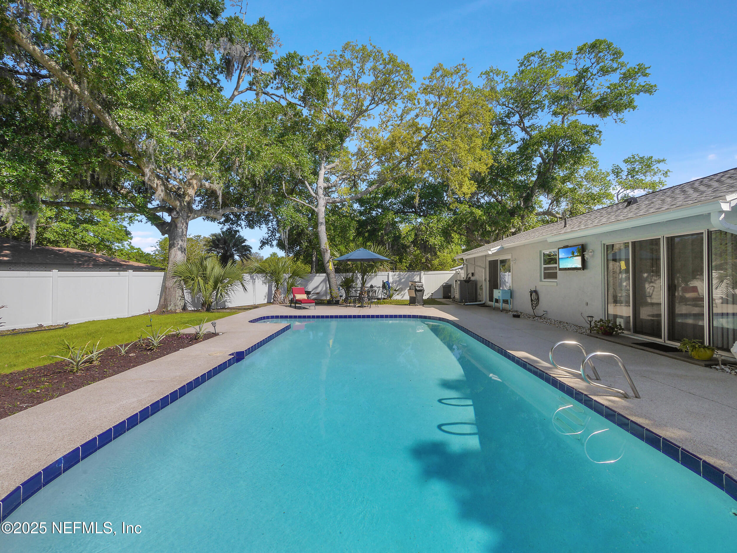 971 Viscaya Boulevard St. Augustine, FL 32086 - Photo 38 of 47 a view of a house with a yard