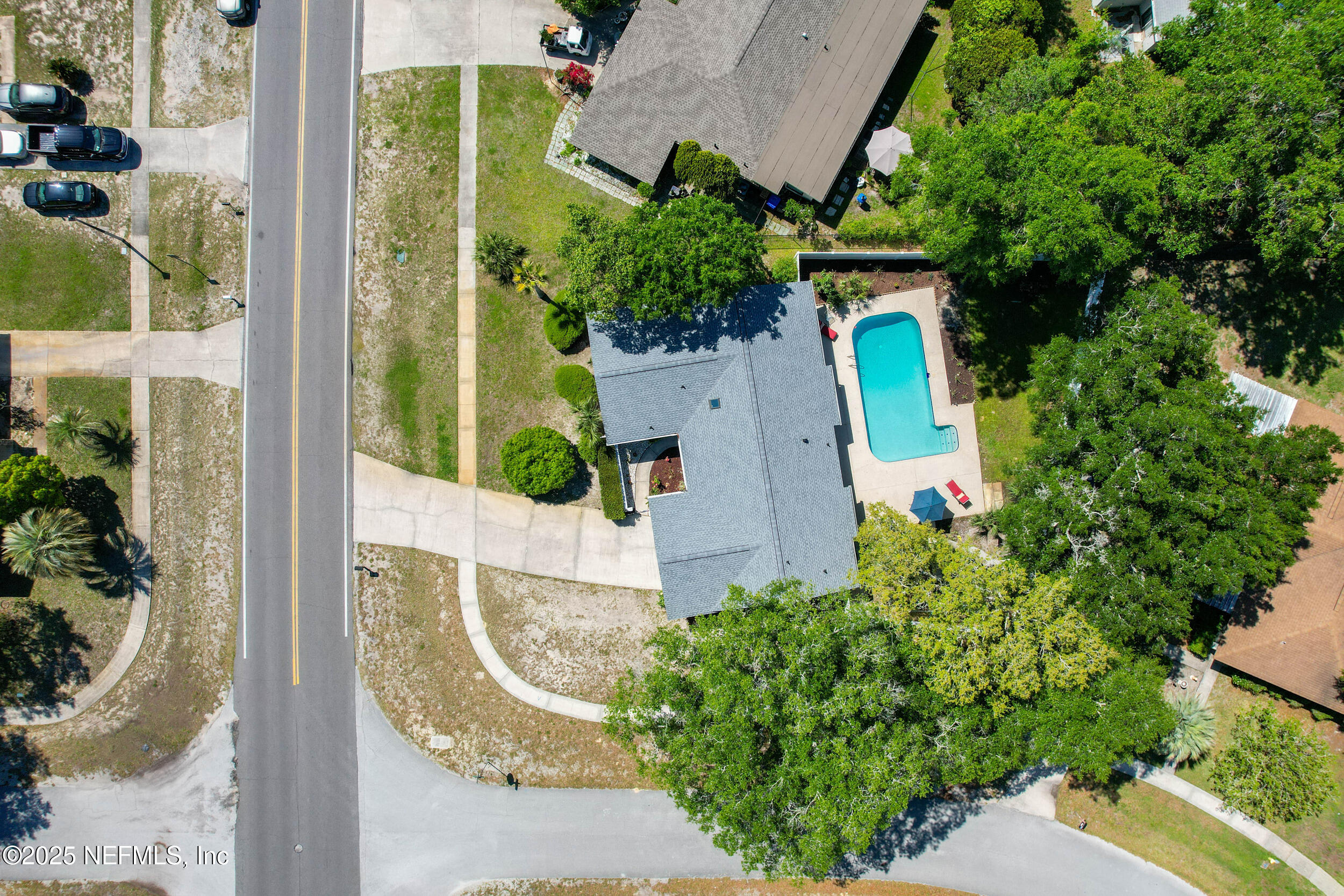 971 Viscaya Boulevard St. Augustine, FL 32086 - Photo 42 of 47 an aerial view of a house with a yard