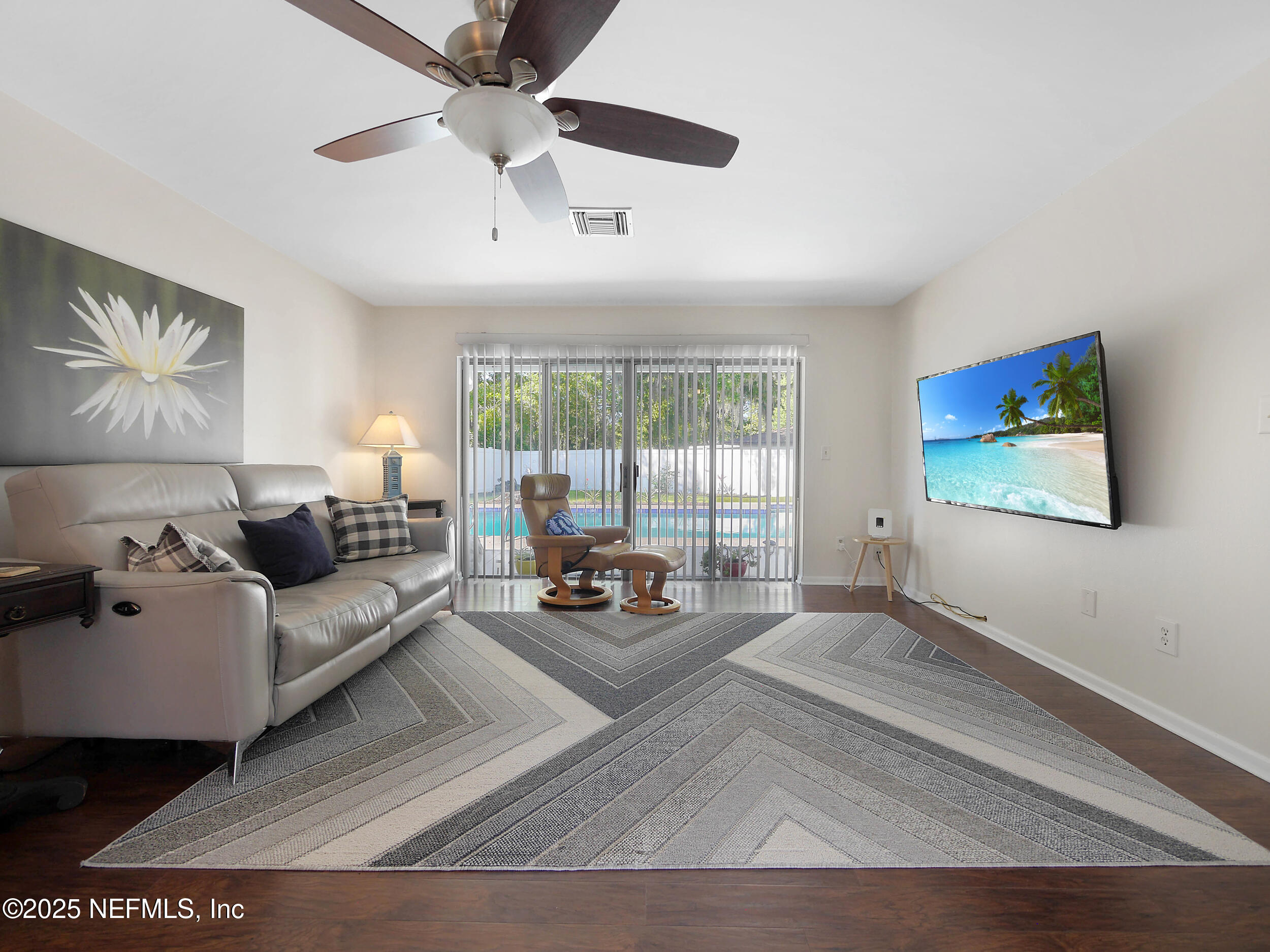 971 Viscaya Boulevard St. Augustine, FL 32086 - Photo 7 of 47 a living room with furniture and a large window