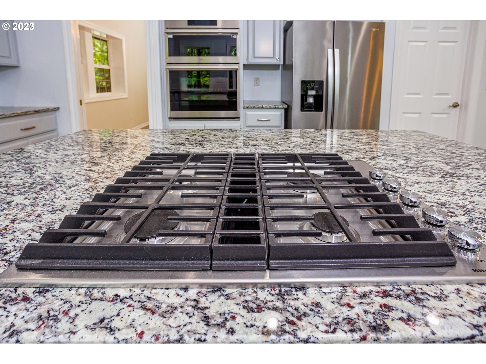 280 South 15th Court Ridgefield, WA 98642 - Photo 11 of 44 a stove top oven sitting inside of a kitchen