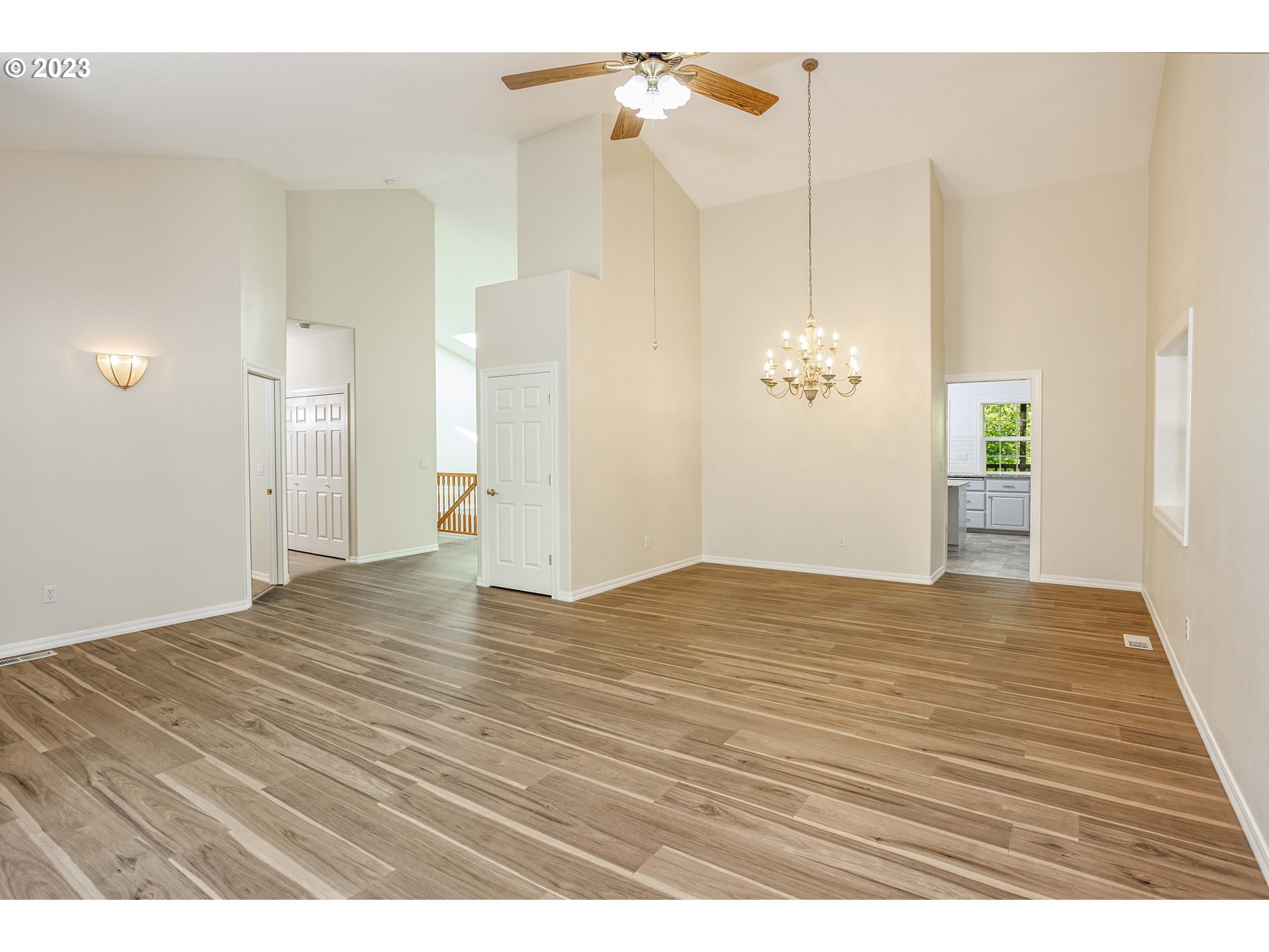 280 South 15th Court Ridgefield, WA 98642 - Photo 13 of 44 a view of empty room with wooden floor