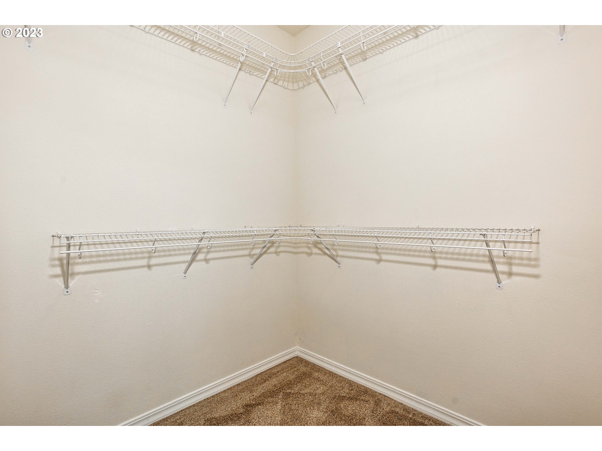 280 South 15th Court Ridgefield, WA 98642 - Photo 18 of 44 a view of a room with racks on the wall