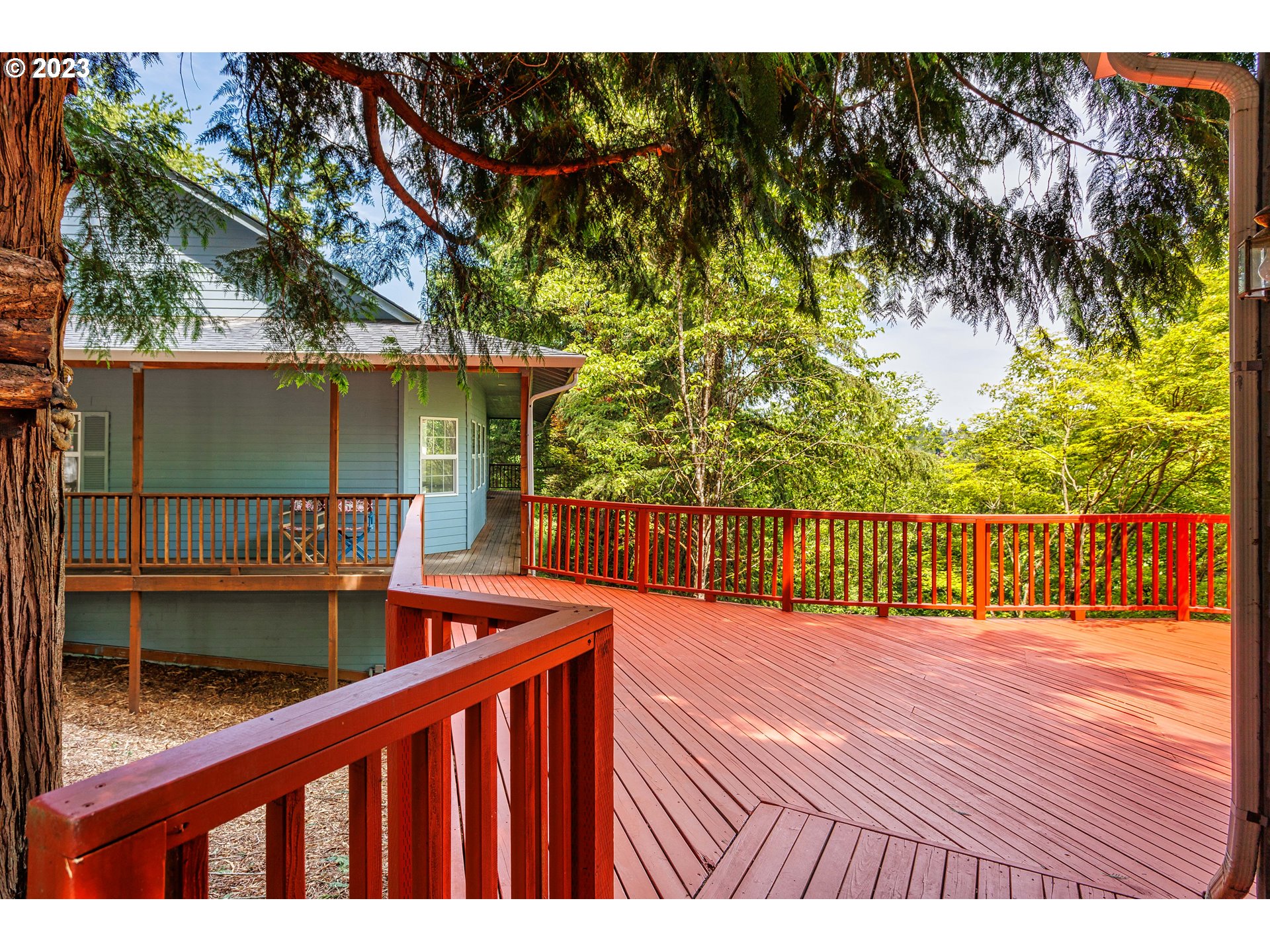 280 South 15th Court Ridgefield, WA 98642 - Photo 29 of 44 a balcony with trees in front of it