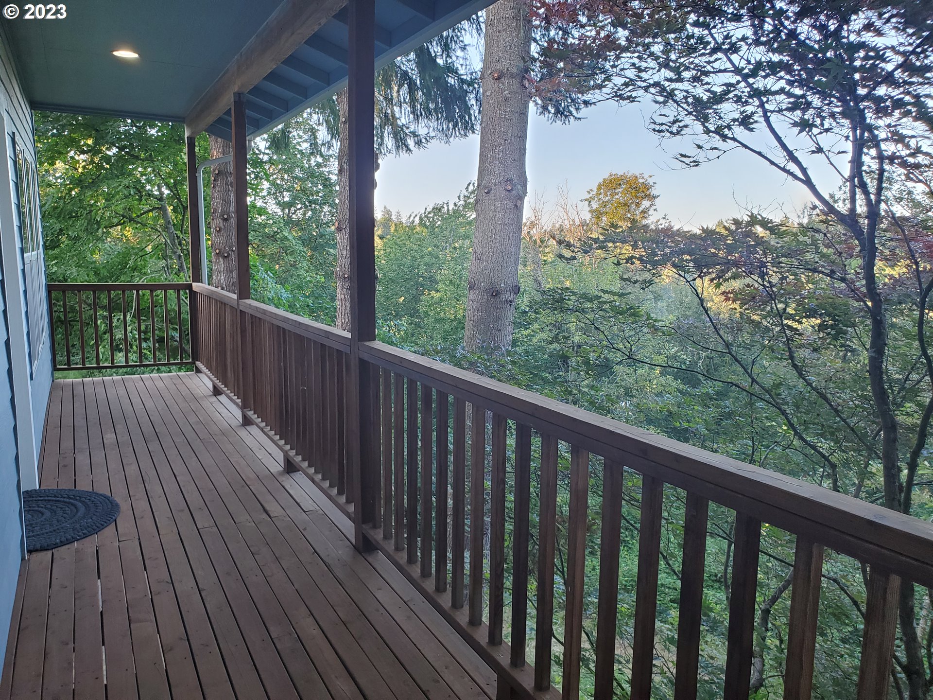 280 South 15th Court Ridgefield, WA 98642 - Photo 42 of 44 a balcony with wooden floor and fence