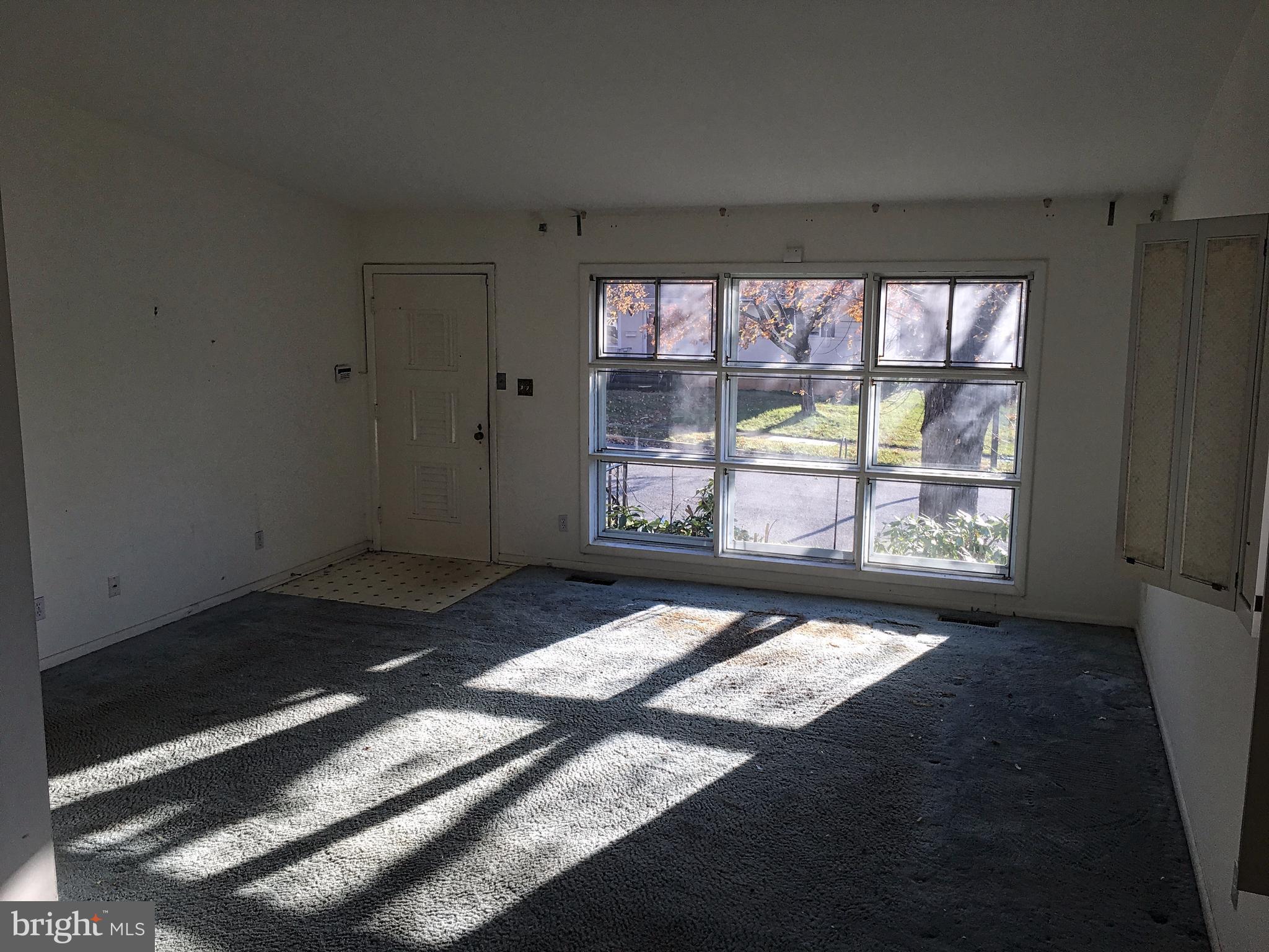 4710 Byron Road Baltimore, MD 21244 - Photo 2 of 24 a view of an empty room and window