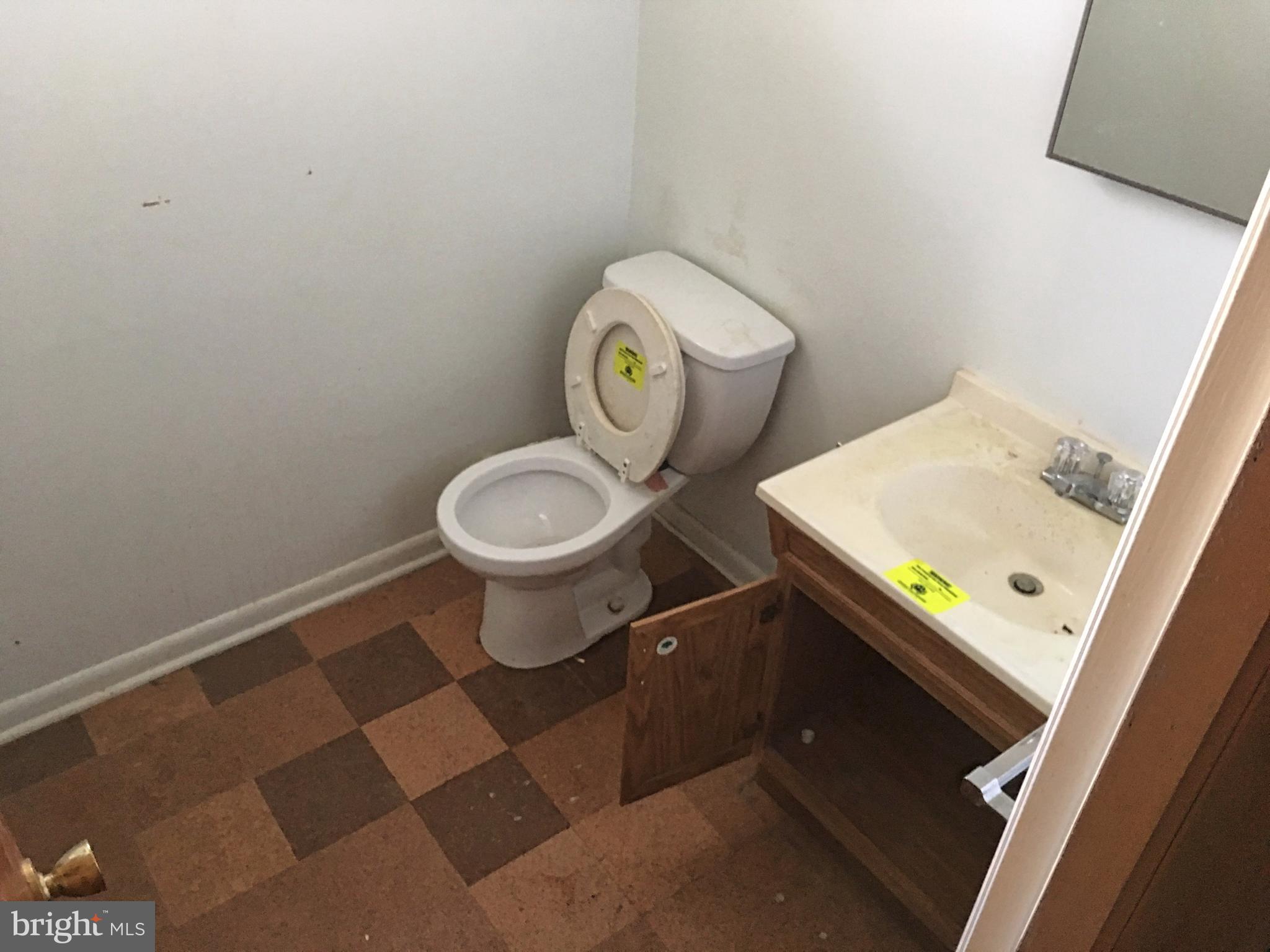 4710 Byron Road Baltimore, MD 21244 - Photo 19 of 24 a bathroom with a sink and a toilet