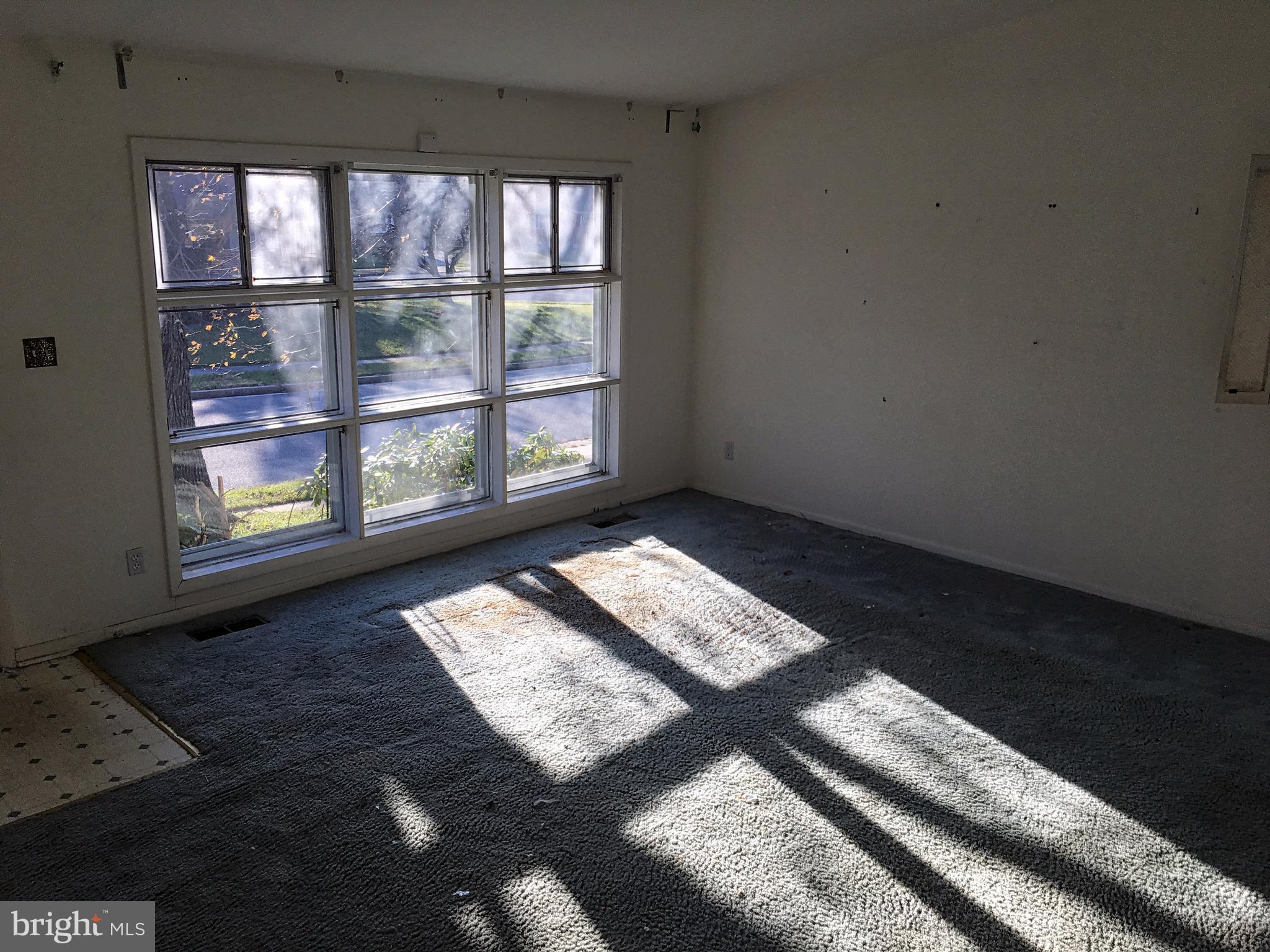 4710 Byron Road Baltimore, MD 21244 - Photo 3 of 24 a view of an empty room with a balcony