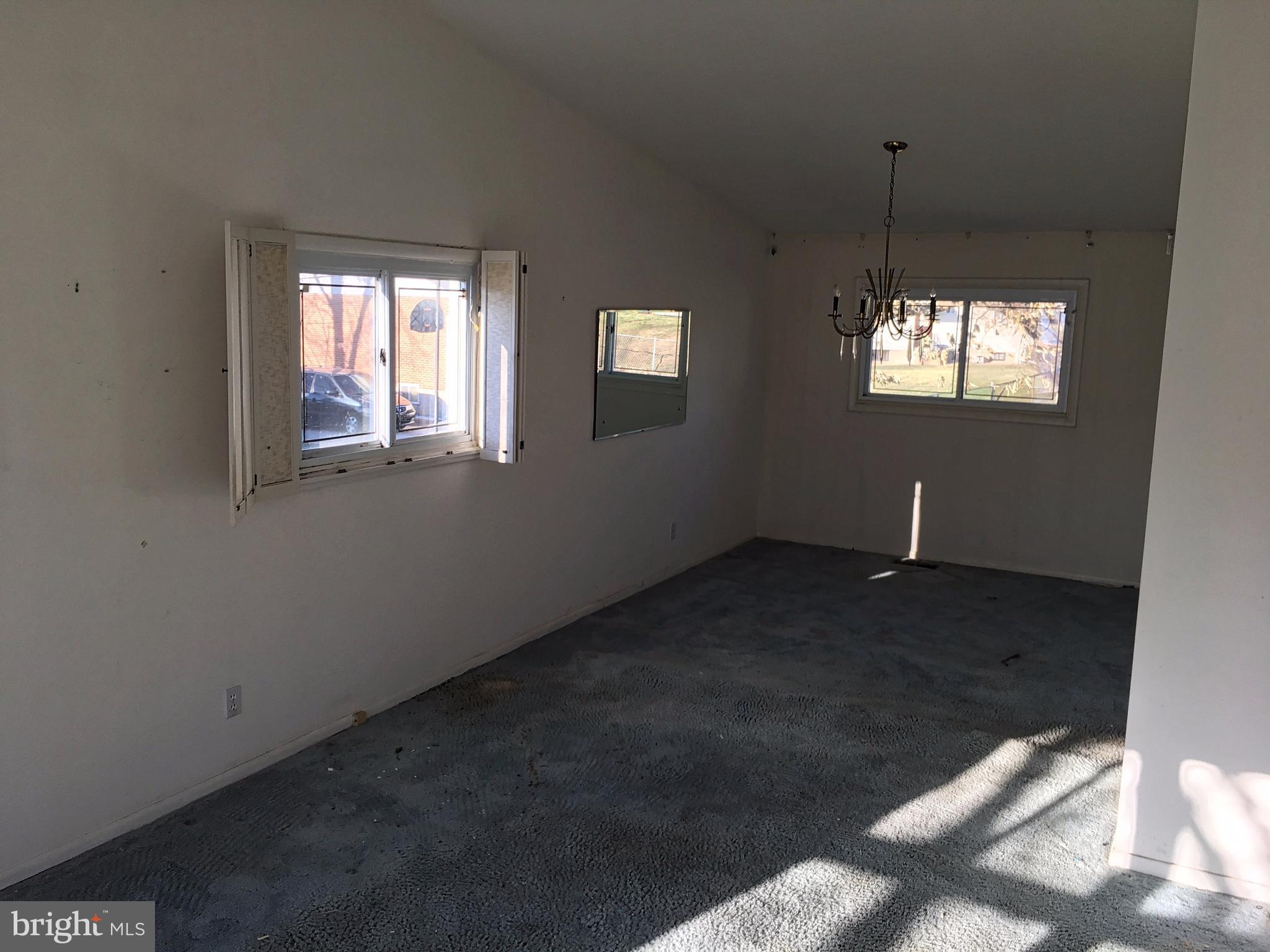 4710 Byron Road Baltimore, MD 21244 - Photo 4 of 24 a view of an empty room and window