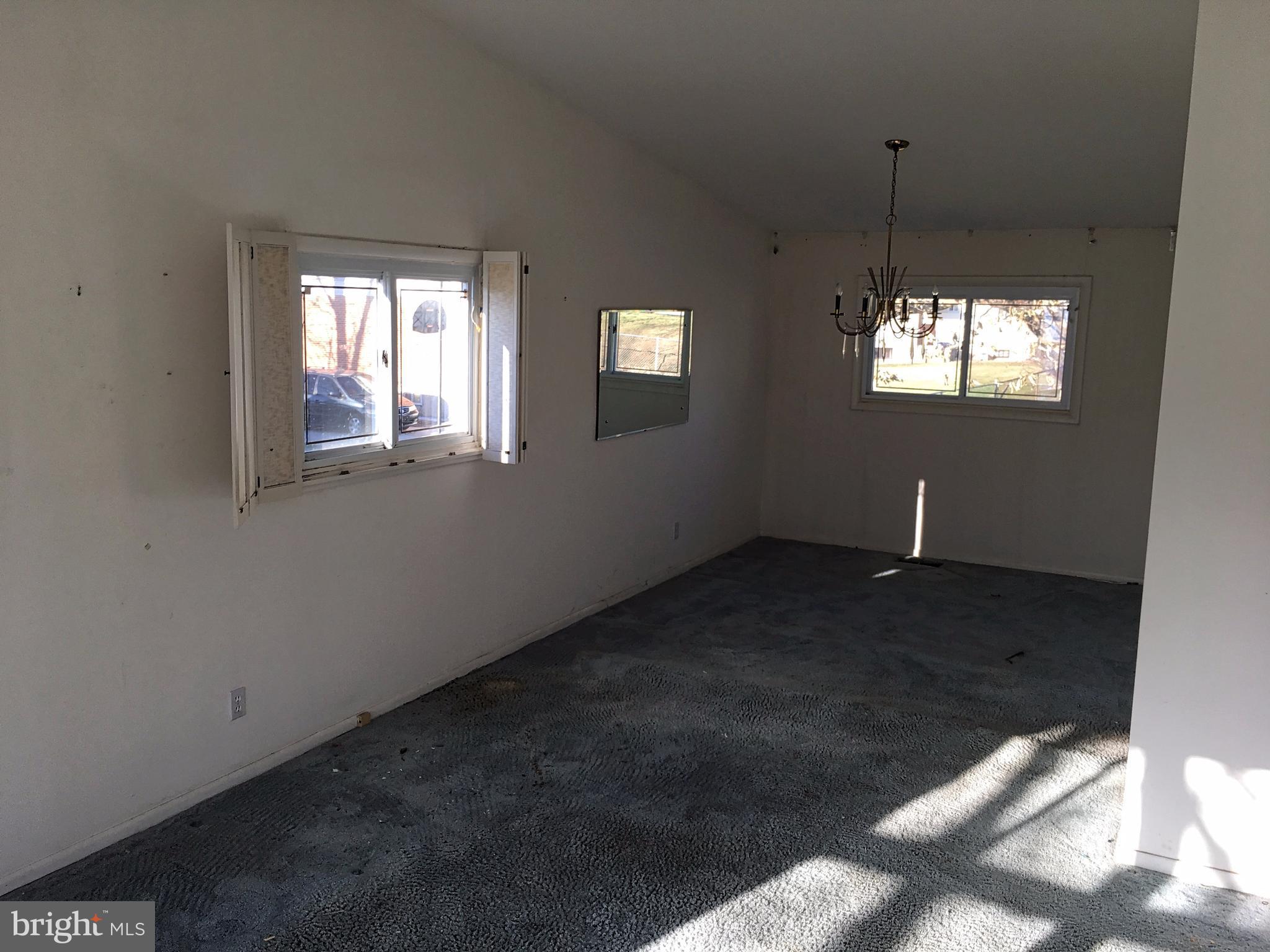 4710 Byron Road Baltimore, MD 21244 - Photo 5 of 24 a view of an empty room and window