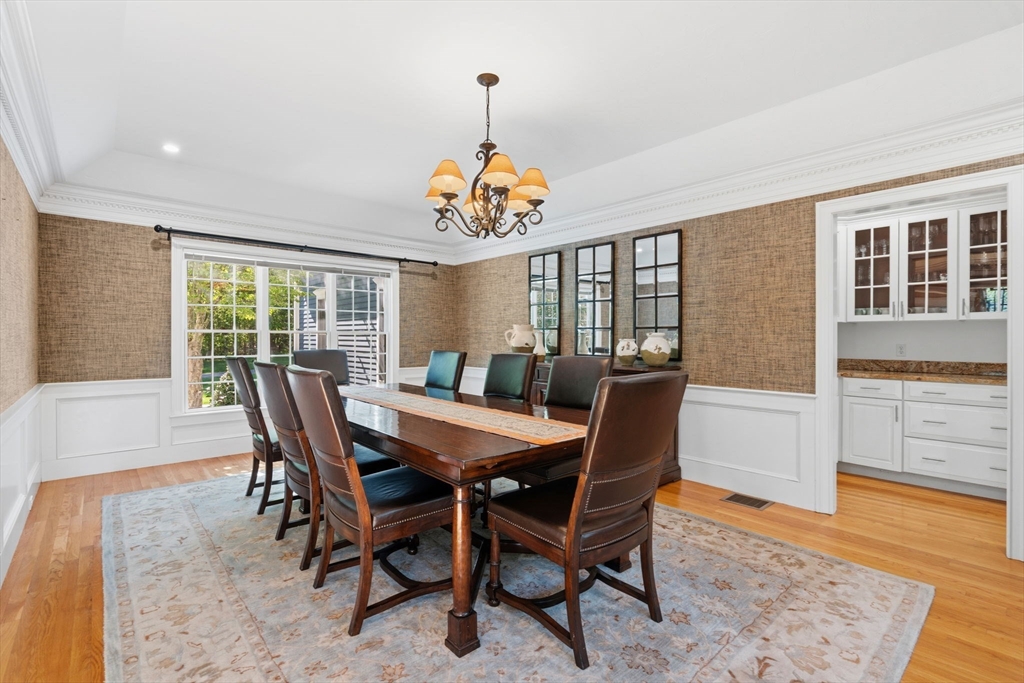 220 Newtown Road Acton, MA 01720 - Photo 11 of 39 a view of a dining room with furniture window and wooden floor