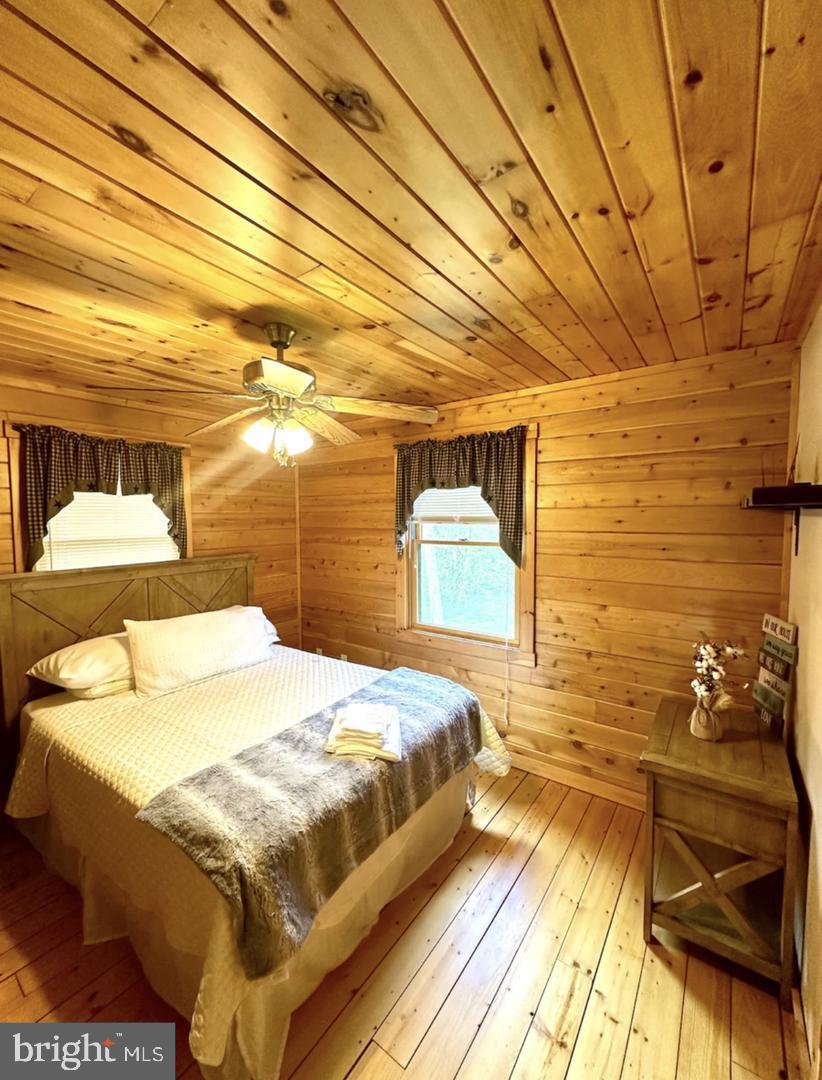 229 Rock Lodge Road McHenry, MD 21541 - Photo 6 of 16 Cozy wooden retreat with natural charm.