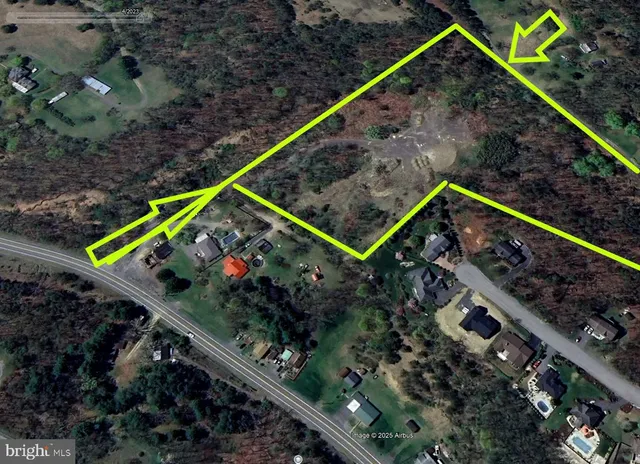 a sign on a wall with a sign board