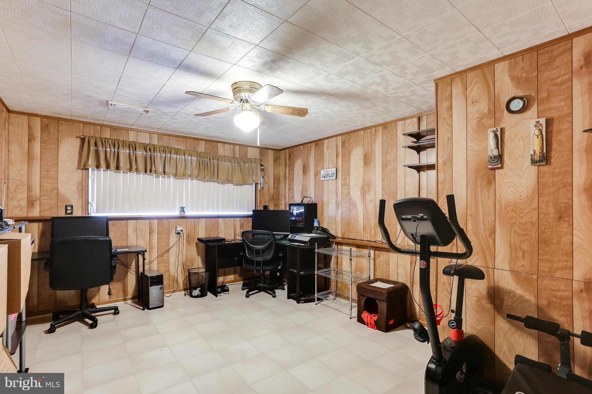 936 Vanderwood Road Baltimore, MD 21228 - Photo 22 of 27 a view of a room with gym equipment