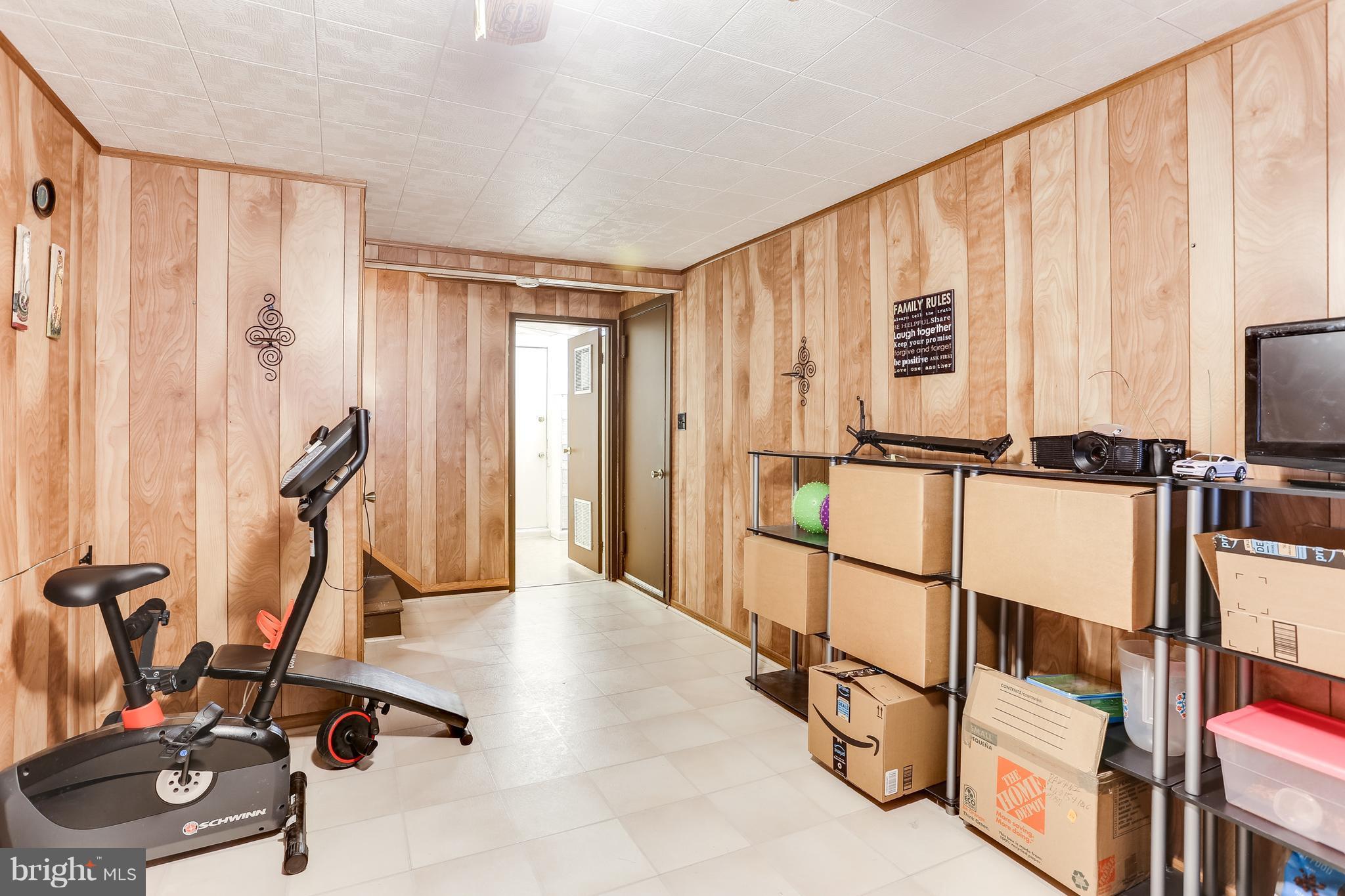 936 Vanderwood Road Baltimore, MD 21228 - Photo 23 of 27 a view of a room with gym equipment