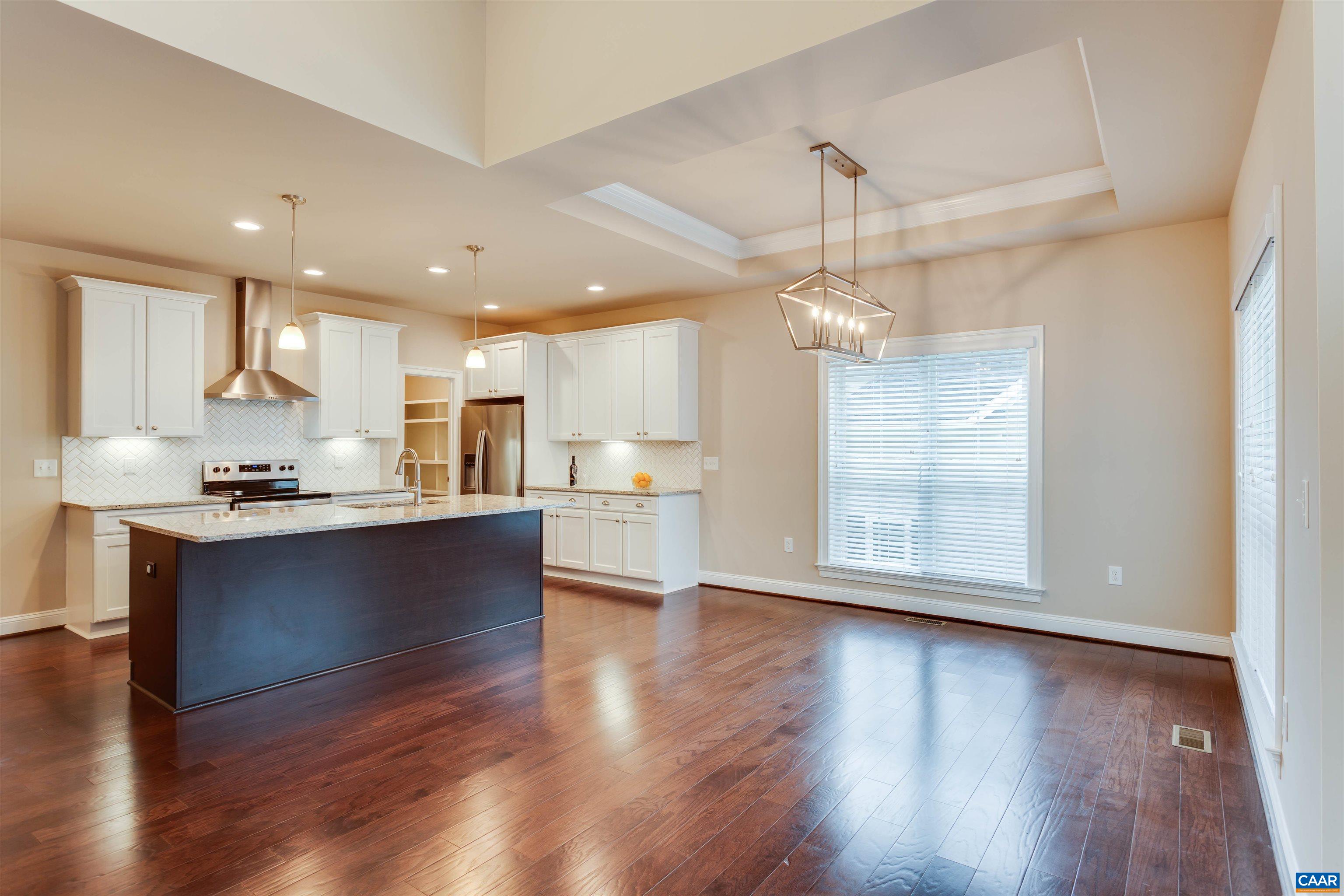 596 Drumin Road Keswick, VA 22947 - Photo 19 of 57 a view of kitchen with wooden floor and window