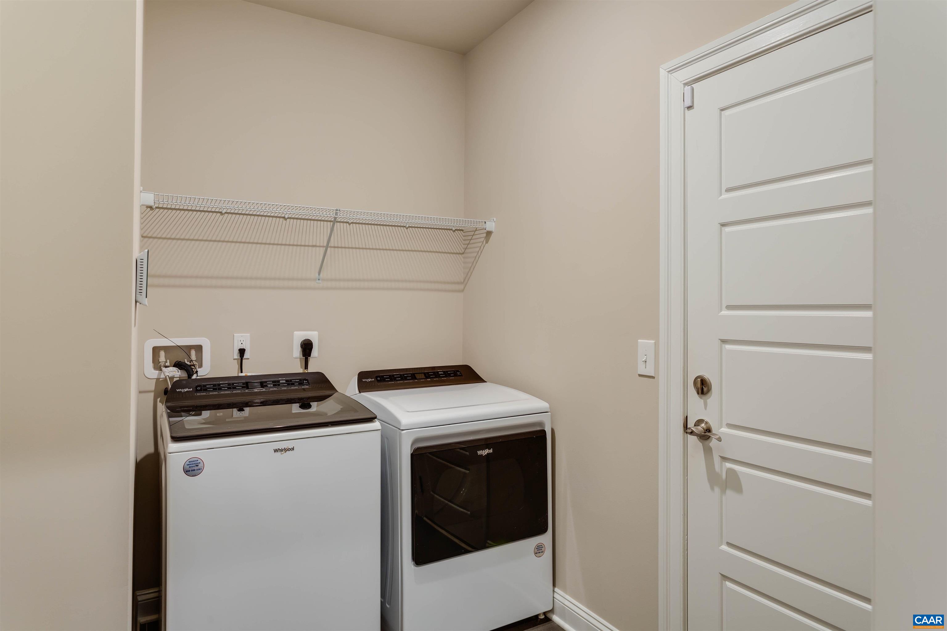 596 Drumin Road Keswick, VA 22947 - Photo 36 of 57 a utility room with dryer and washer