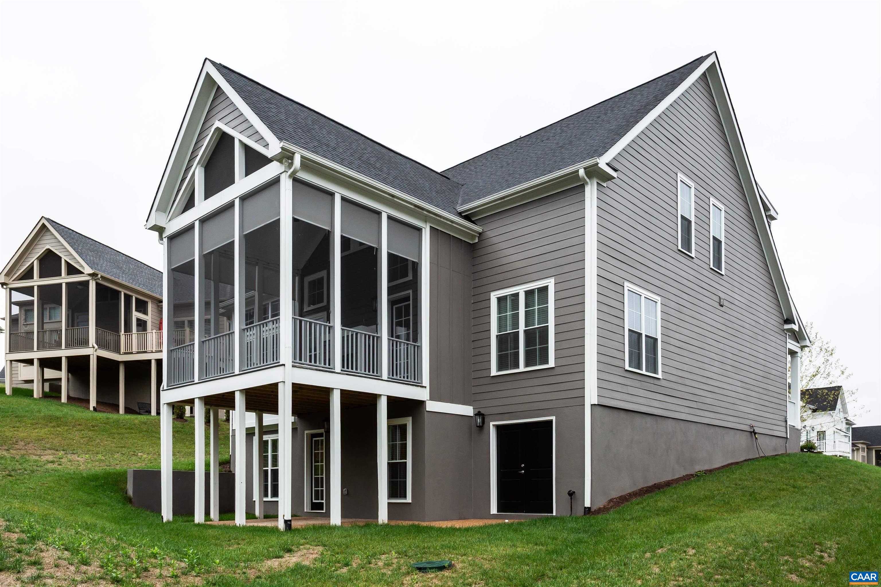 596 Drumin Road Keswick, VA 22947 - Photo 50 of 57 a view of a house with yard and porch