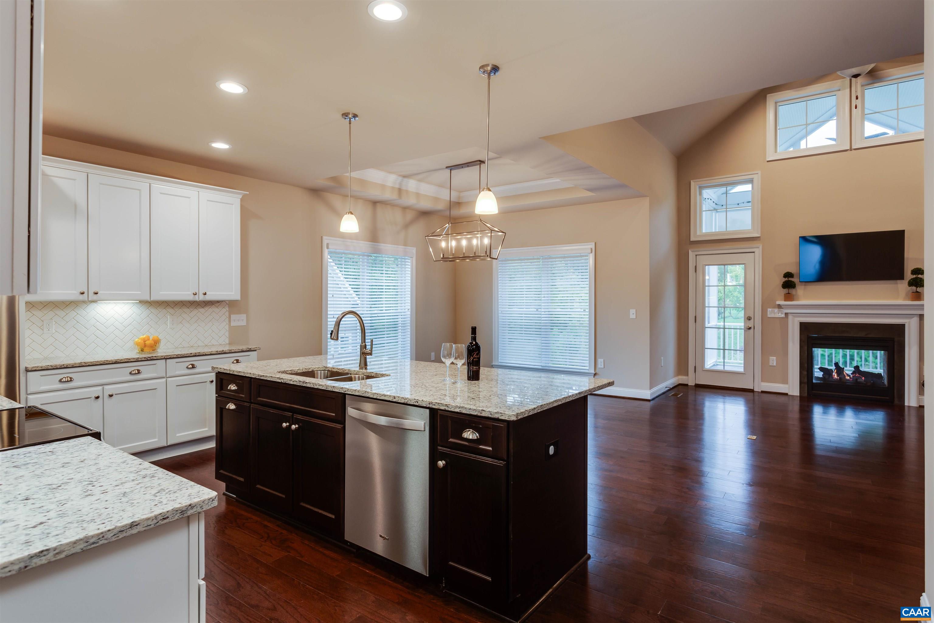 596 Drumin Road Keswick, VA 22947 - Photo 9 of 57 a kitchen with sink cabinets and wooden floor