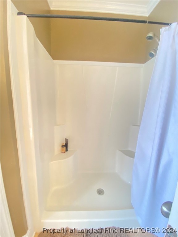 2729 H Bullard Road Hope Mills, NC 28348 - Photo 12 of 15 a bathroom with a shower