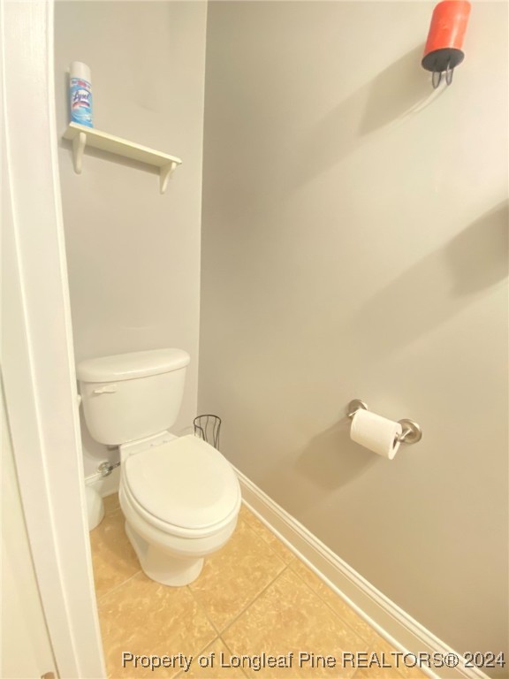 2729 H Bullard Road Hope Mills, NC 28348 - Photo 13 of 15 a bathroom with a toilet and a shower