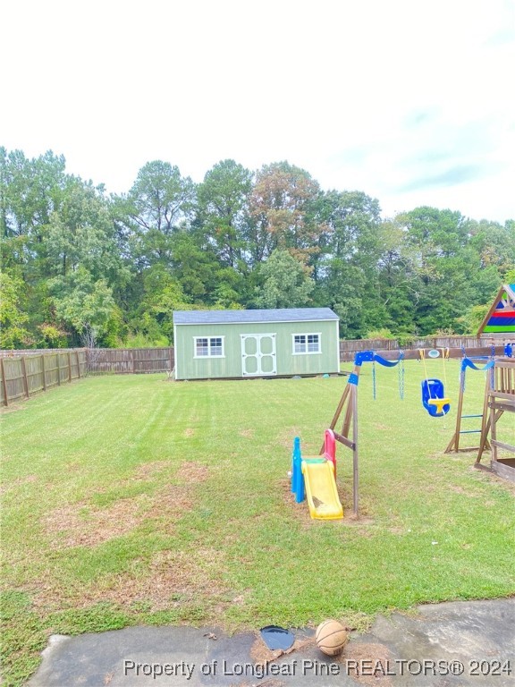 2729 H Bullard Road Hope Mills, NC 28348 - Photo 14 of 15 a view of outdoor space with garden