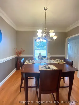 a large kitchen with stainless steel appliances granite countertop a stove a sink dishwasher and granite countertops with cabinets