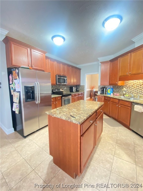 2729 H Bullard Road Hope Mills, NC 28348 - Photo 6 of 15 a kitchen with stainless steel appliances granite countertop a stove a sink and a microwave