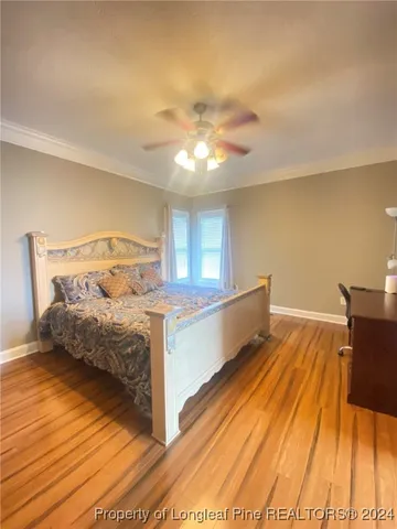 a spacious bathroom with a tub and shower