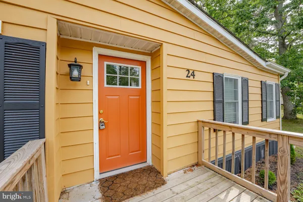 a view of front door and deck