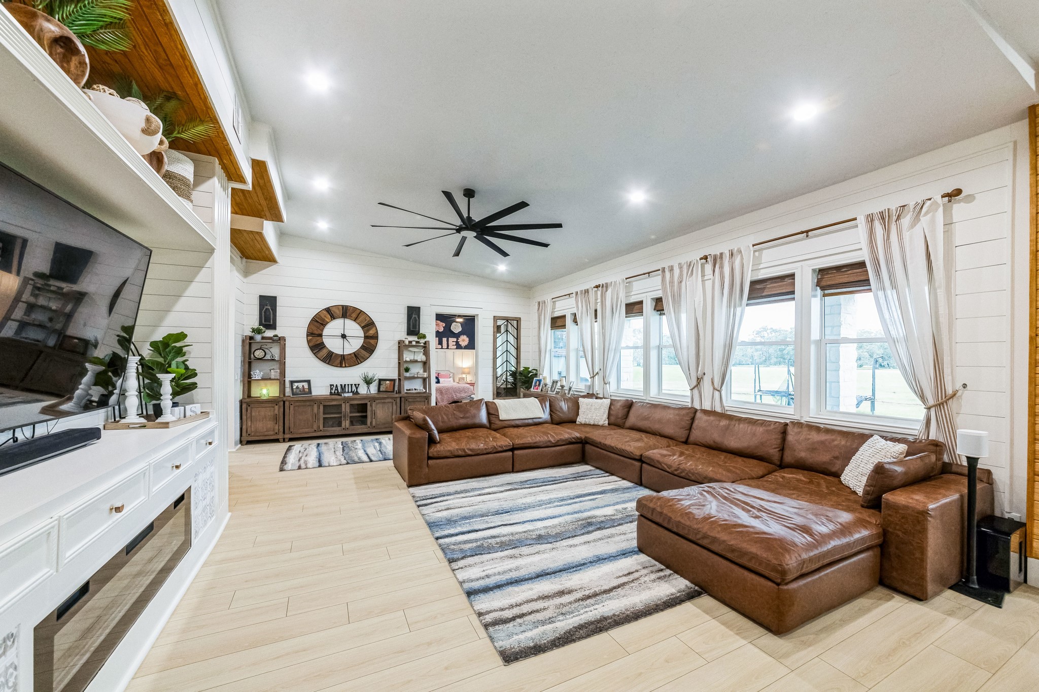 209 Horse Shoe Trail Angleton, TX 77515 - Photo 1 of 43 a living room with furniture and a large window