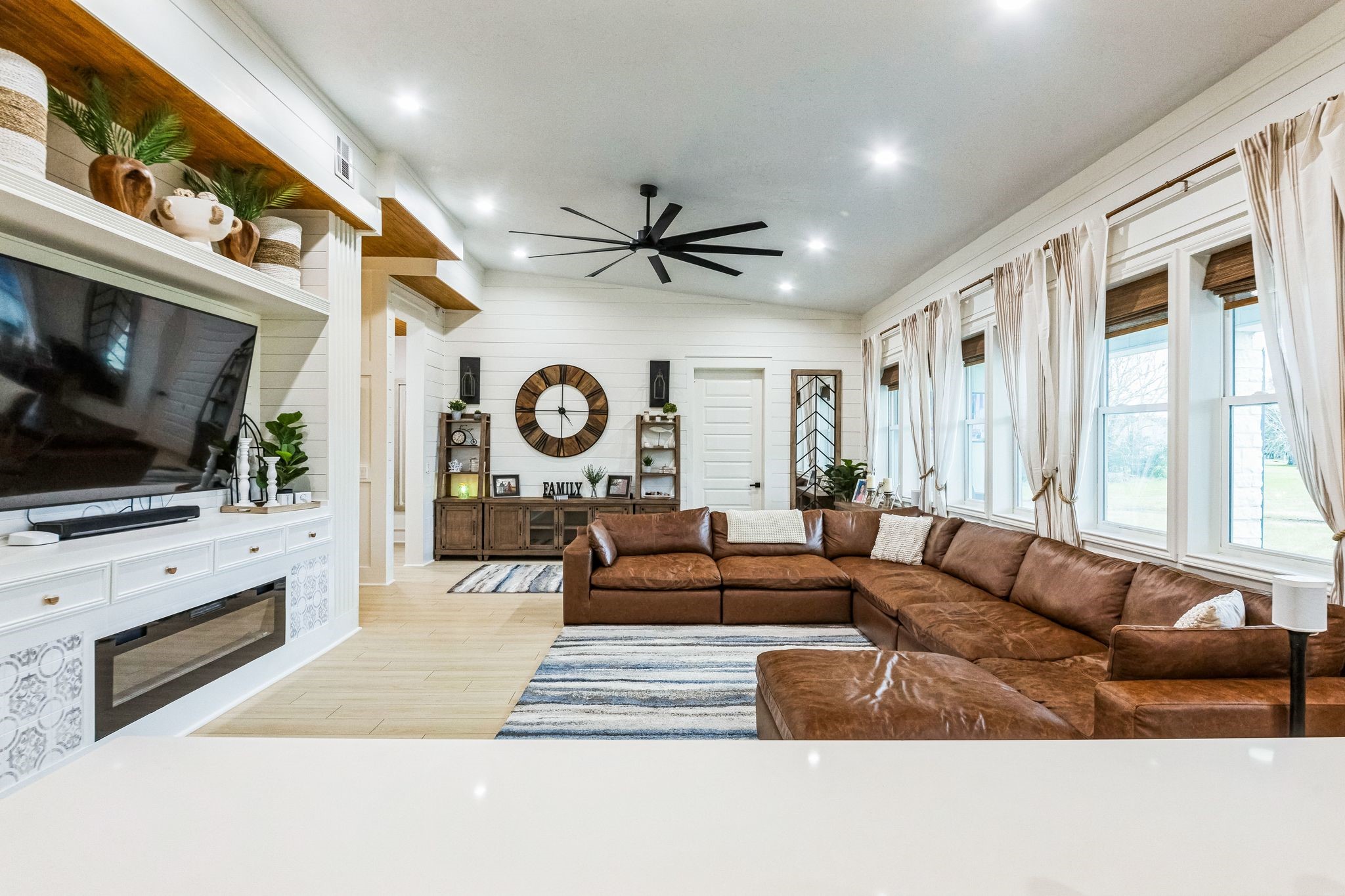 209 Horse Shoe Trail Angleton, TX 77515 - Photo 17 of 43 a living room with furniture and a flat screen tv