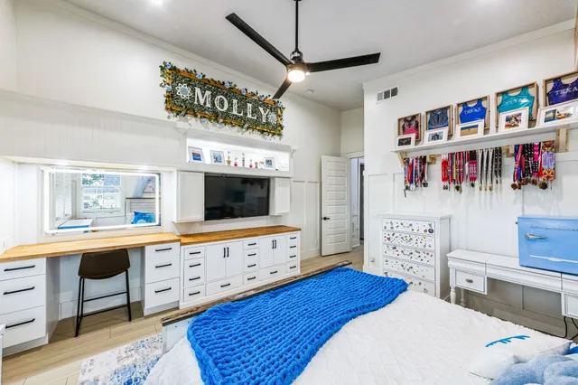 a kitchen with stainless steel appliances a sink stove and cabinets