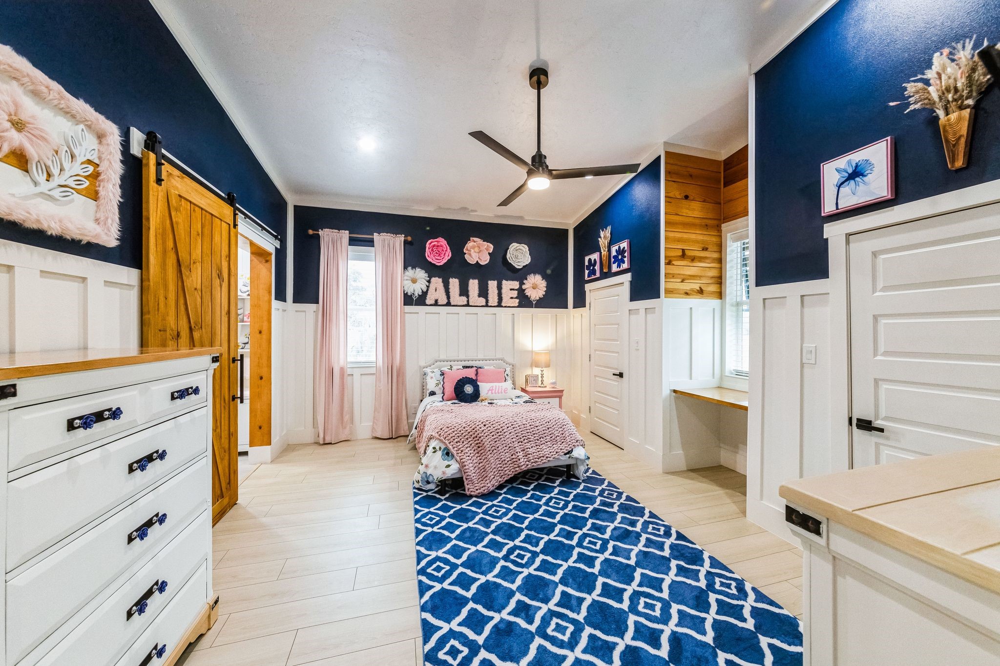 209 Horse Shoe Trail Angleton, TX 77515 - Photo 29 of 43 a bedroom with a bed and wooden floor