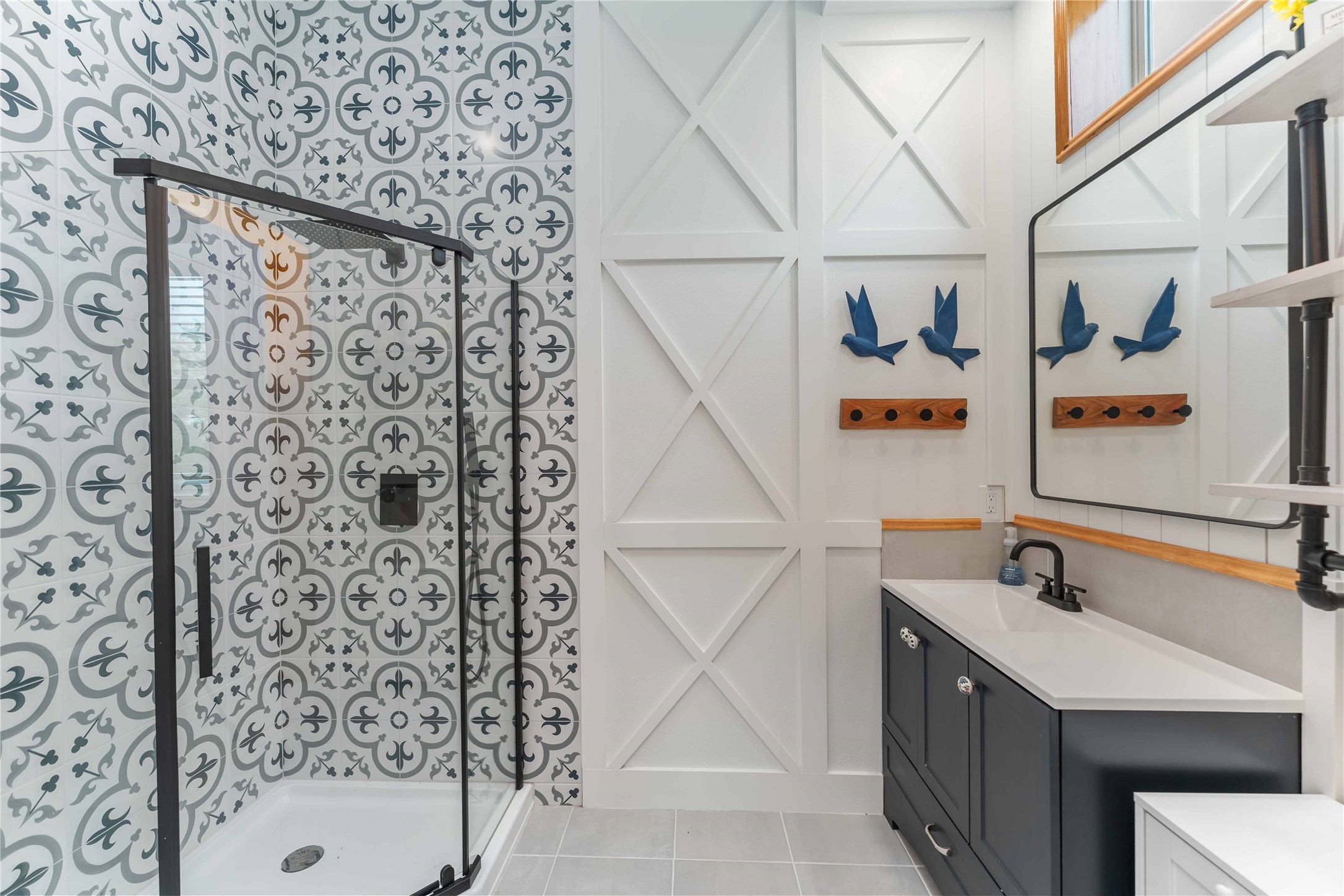 209 Horse Shoe Trail Angleton, TX 77515 - Photo 31 of 43 a bathroom with a sink and mirror