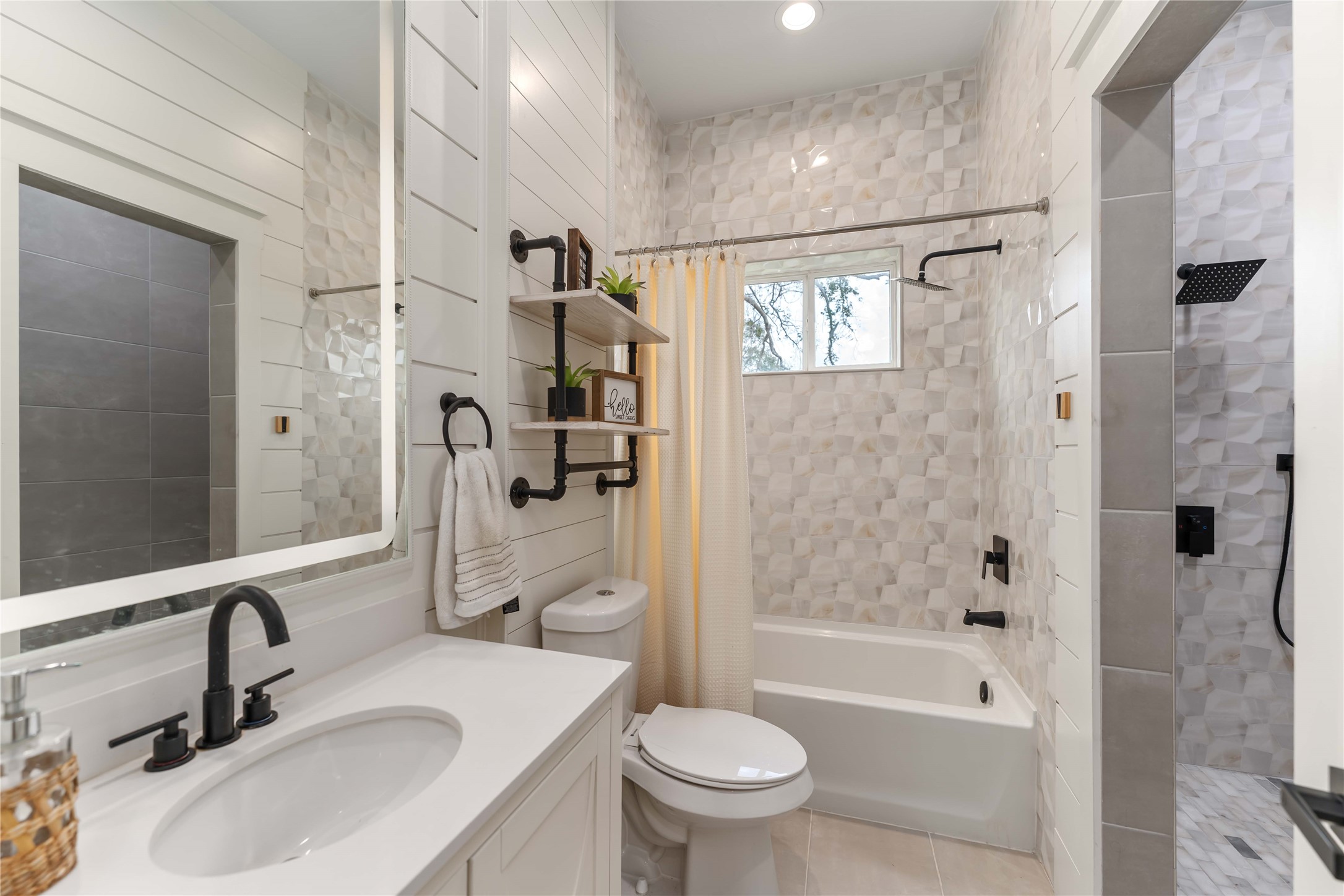 209 Horse Shoe Trail Angleton, TX 77515 - Photo 32 of 43 a bathroom with a sink toilet tub and shower