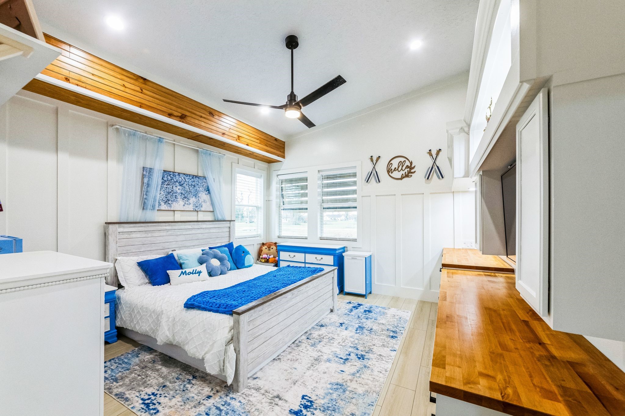 209 Horse Shoe Trail Angleton, TX 77515 - Photo 36 of 43 a bedroom with a bed and wooden floor