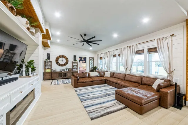 a bed room with a bed and a window