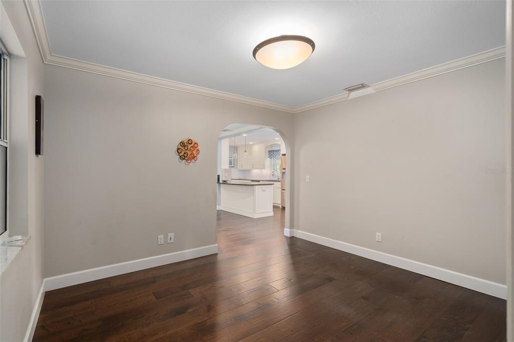 744 Cornwall Road Winter Park, FL 32792 - Photo 34 of 57 a view of a kitchen with wooden floor and window