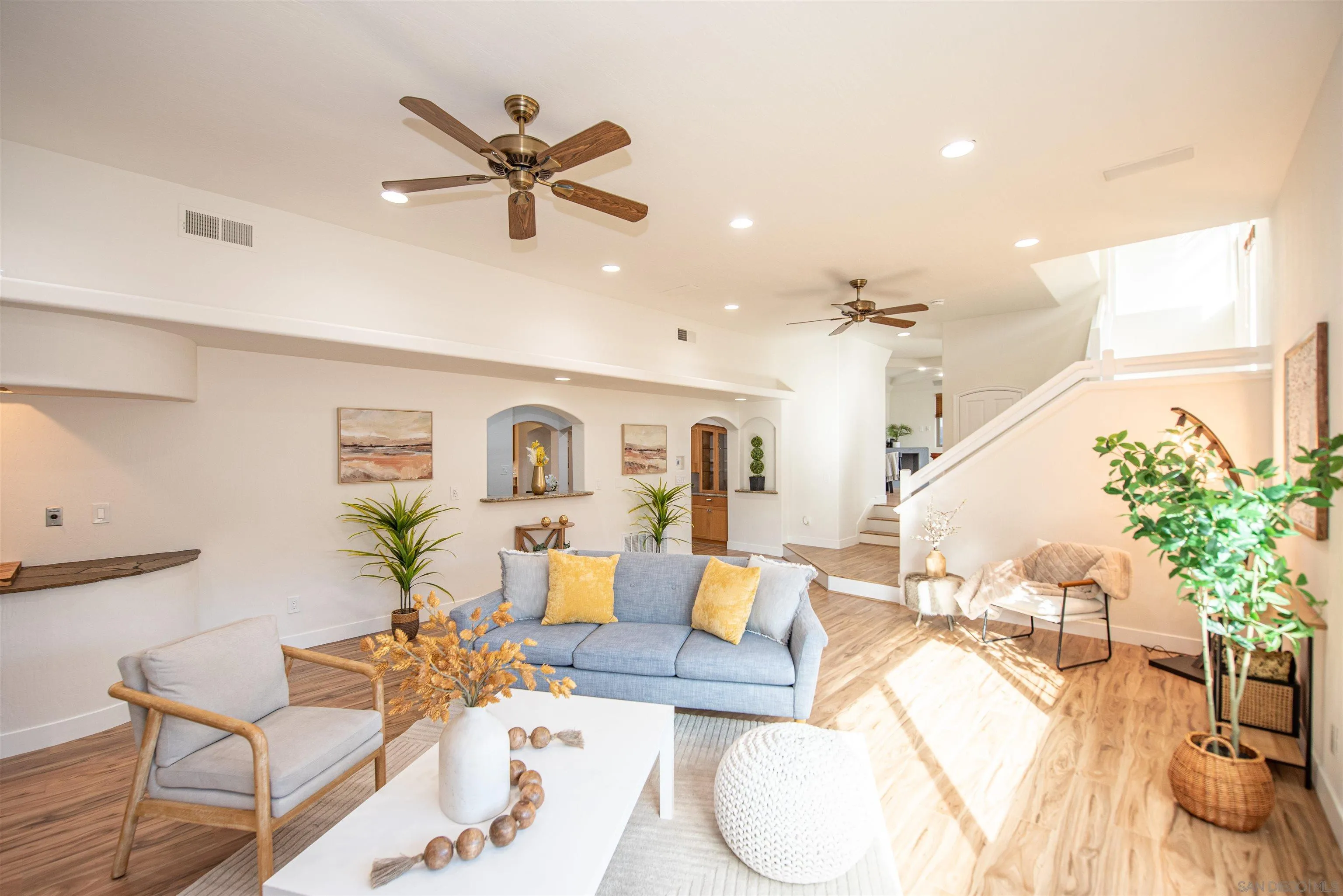 13419 Sebago Avenue Poway, CA 92064 - Photo 22 of 44 a living room with furniture and a ceiling fan