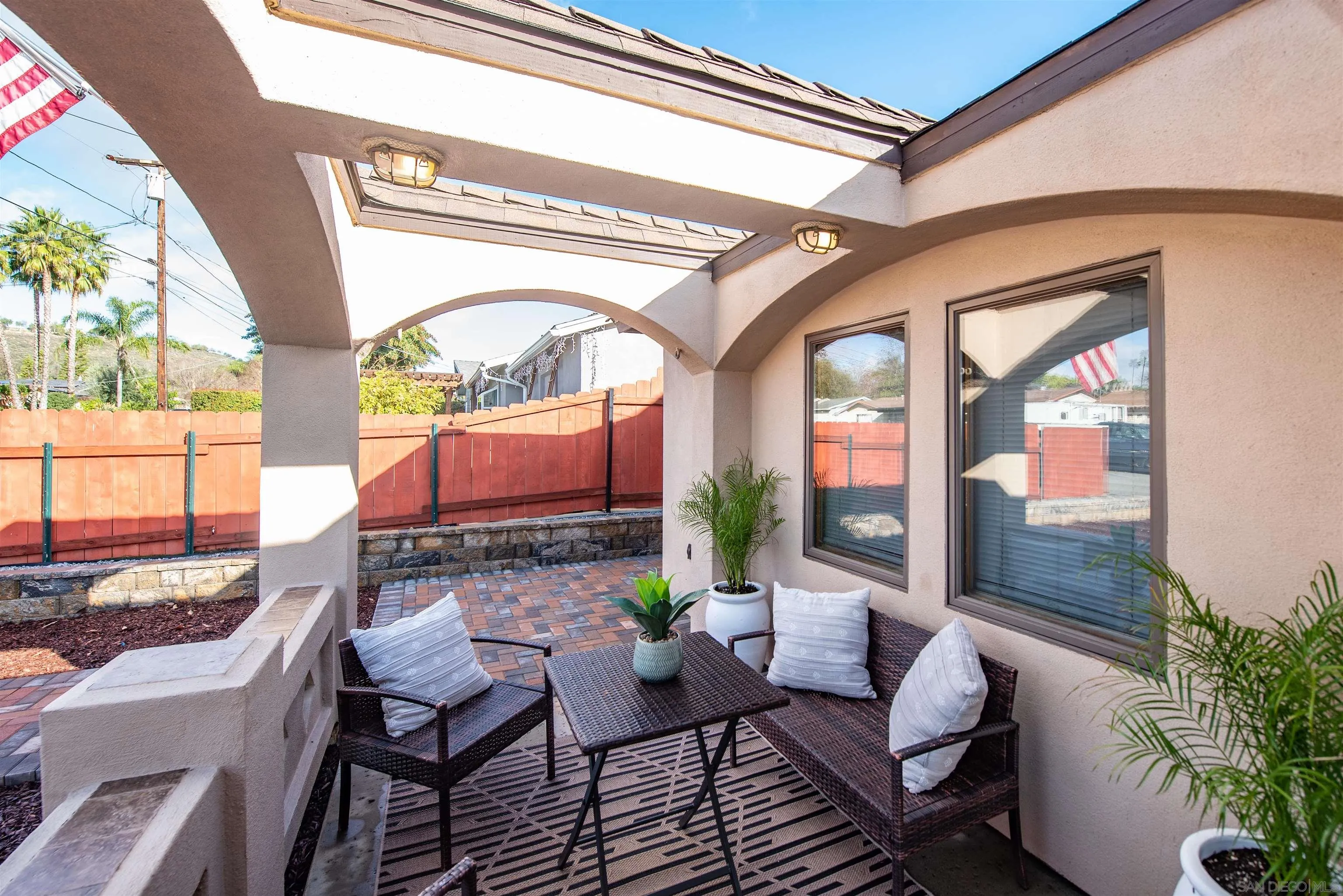 13419 Sebago Avenue Poway, CA 92064 - Photo 5 of 44 a living room with furniture and a floor to ceiling window