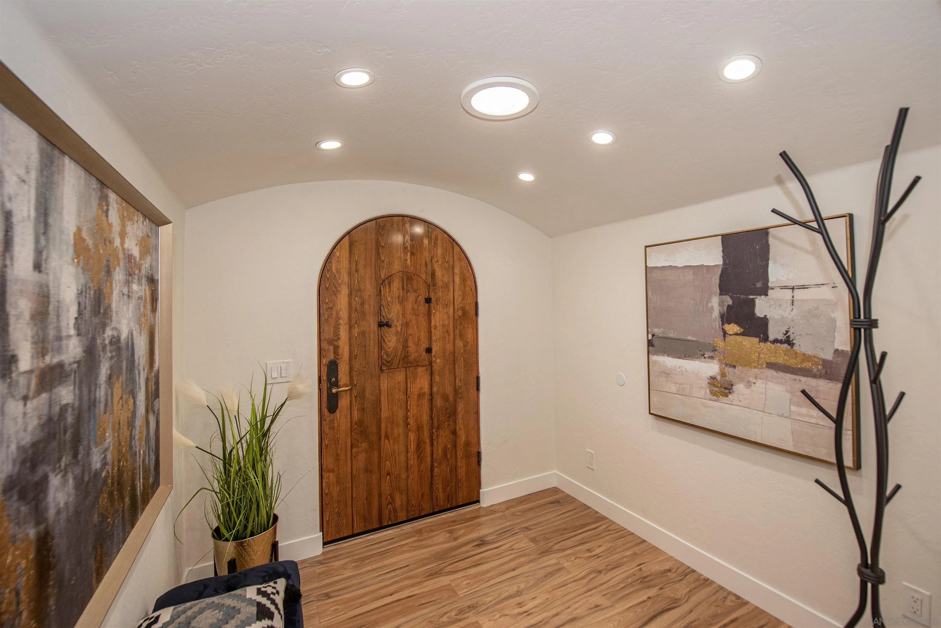 13419 Sebago Avenue Poway, CA 92064 - Photo 7 of 44 a view of entryway with wooden floor