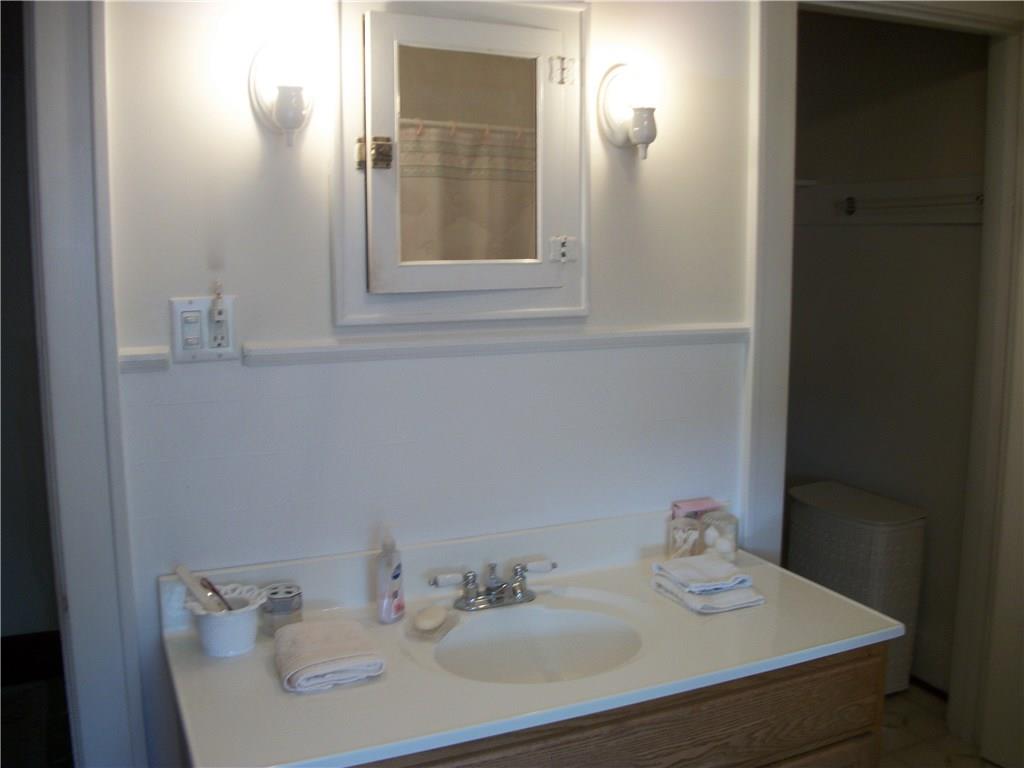 524 South Eighty Eight Road Carmichaels, PA 15320 - Photo 17 of 17 SINK AND VANITY WITH ORIGINAL BUILT INCABINET AND LARGE WALK IN CLOSET