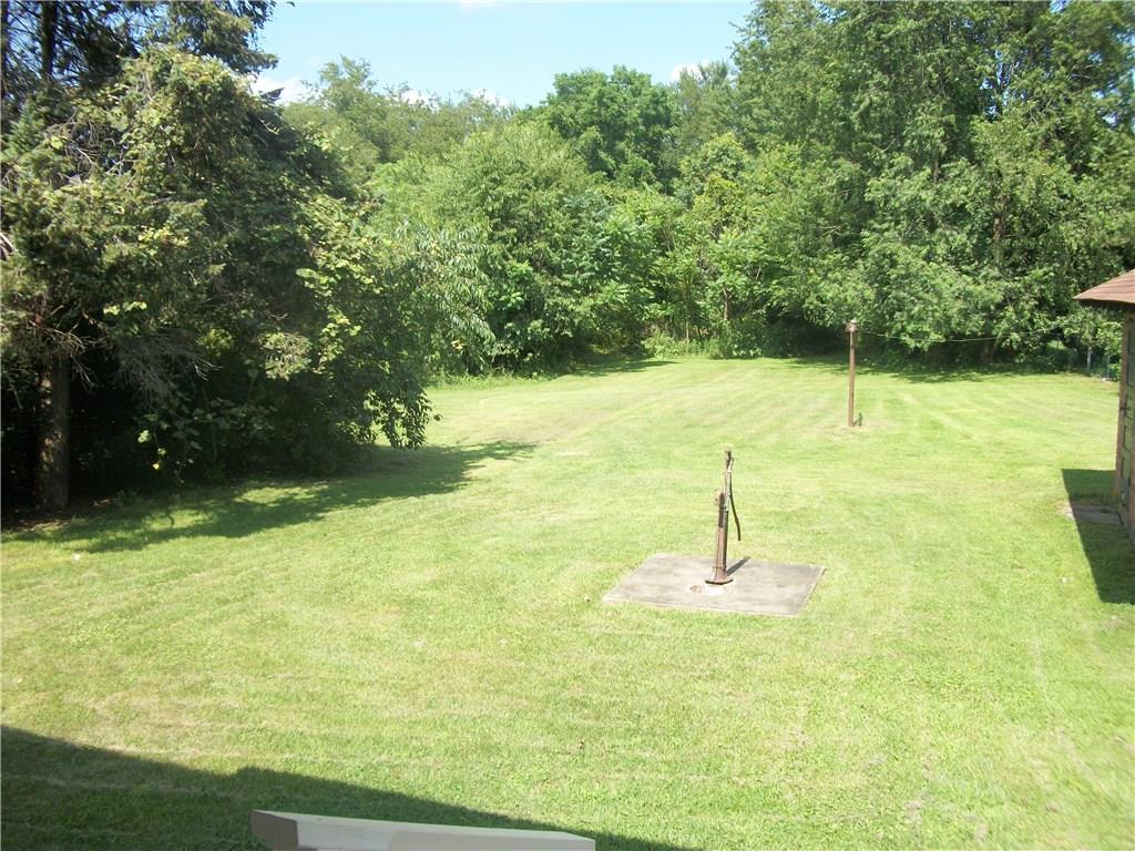 524 South Eighty Eight Road Carmichaels, PA 15320 - Photo 4 of 17 LEVEL BACKYARD SHOWING TREED LOTS IN REAR