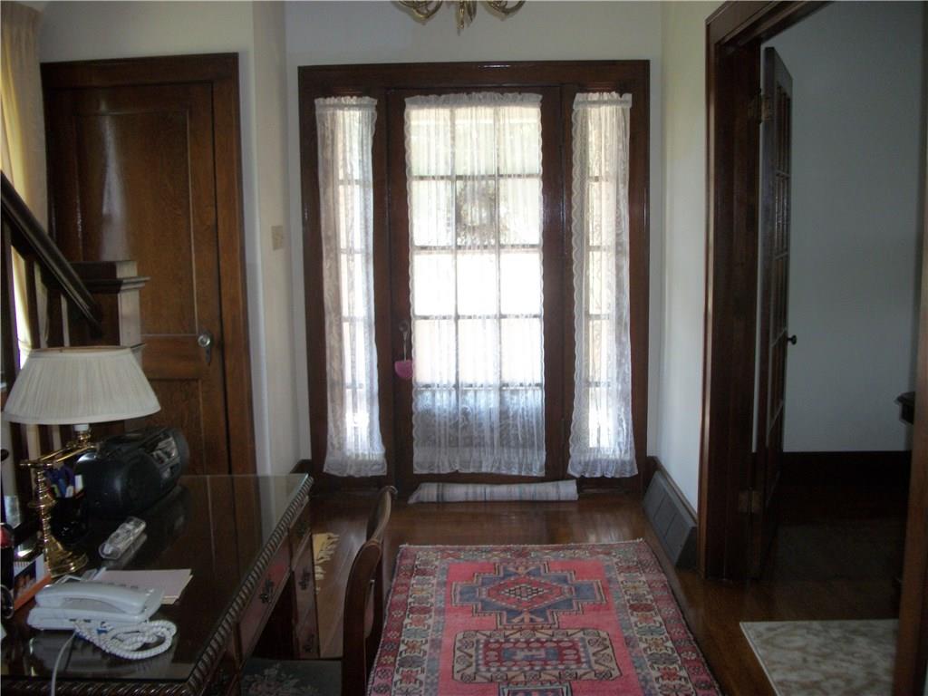 524 South Eighty Eight Road Carmichaels, PA 15320 - Photo 9 of 17 BEAUTIFUL ALL NATURAL WOODWORK AND FLOORING IN ENTRY WAY FROM FRONT PORCH