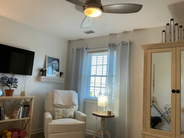 a bedroom with furniture and a bed