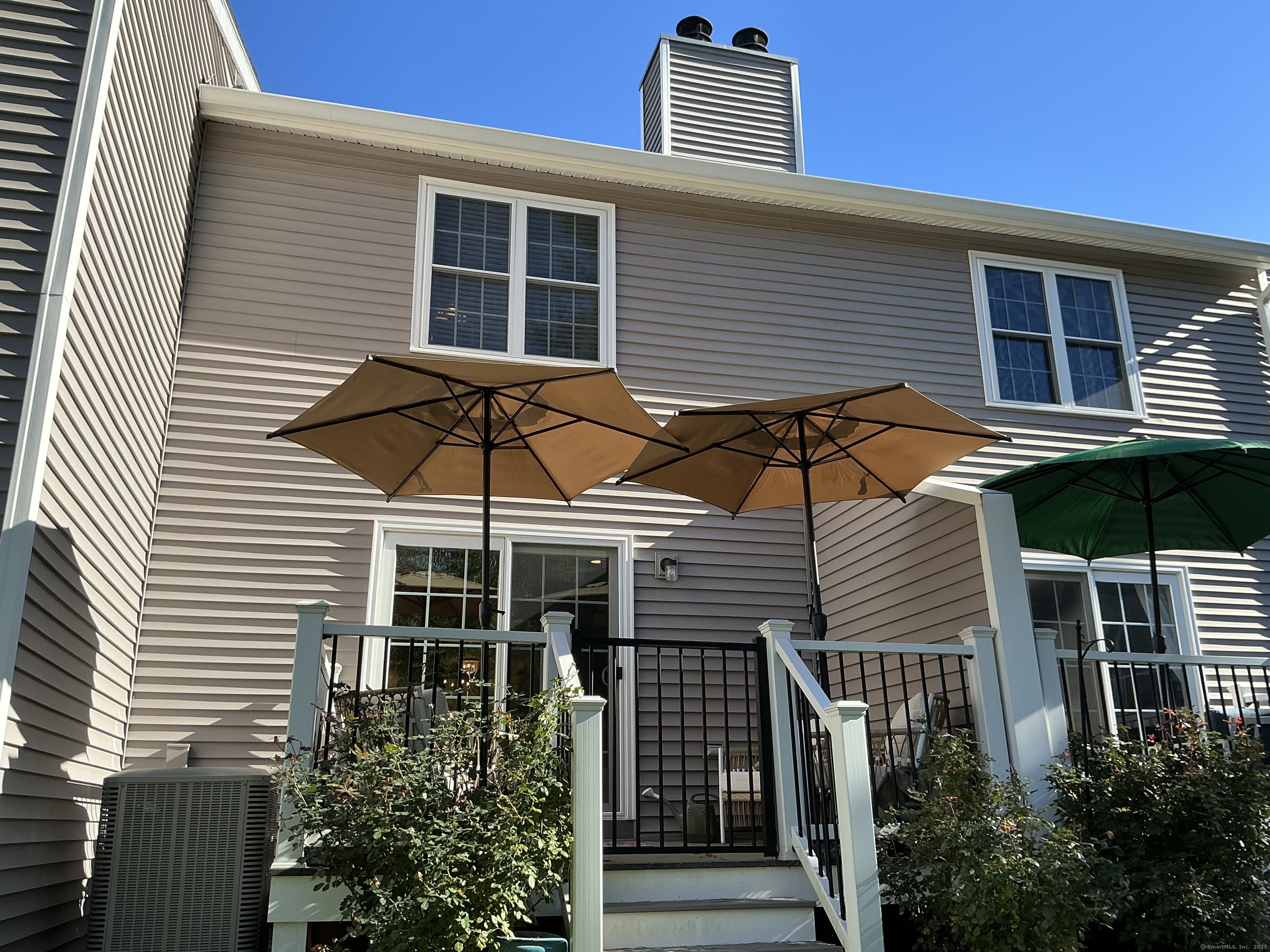 751 Long Hill Road, Unit C Middletown, CT 06457 - Photo 27 of 30 a front view of a house with a balcony